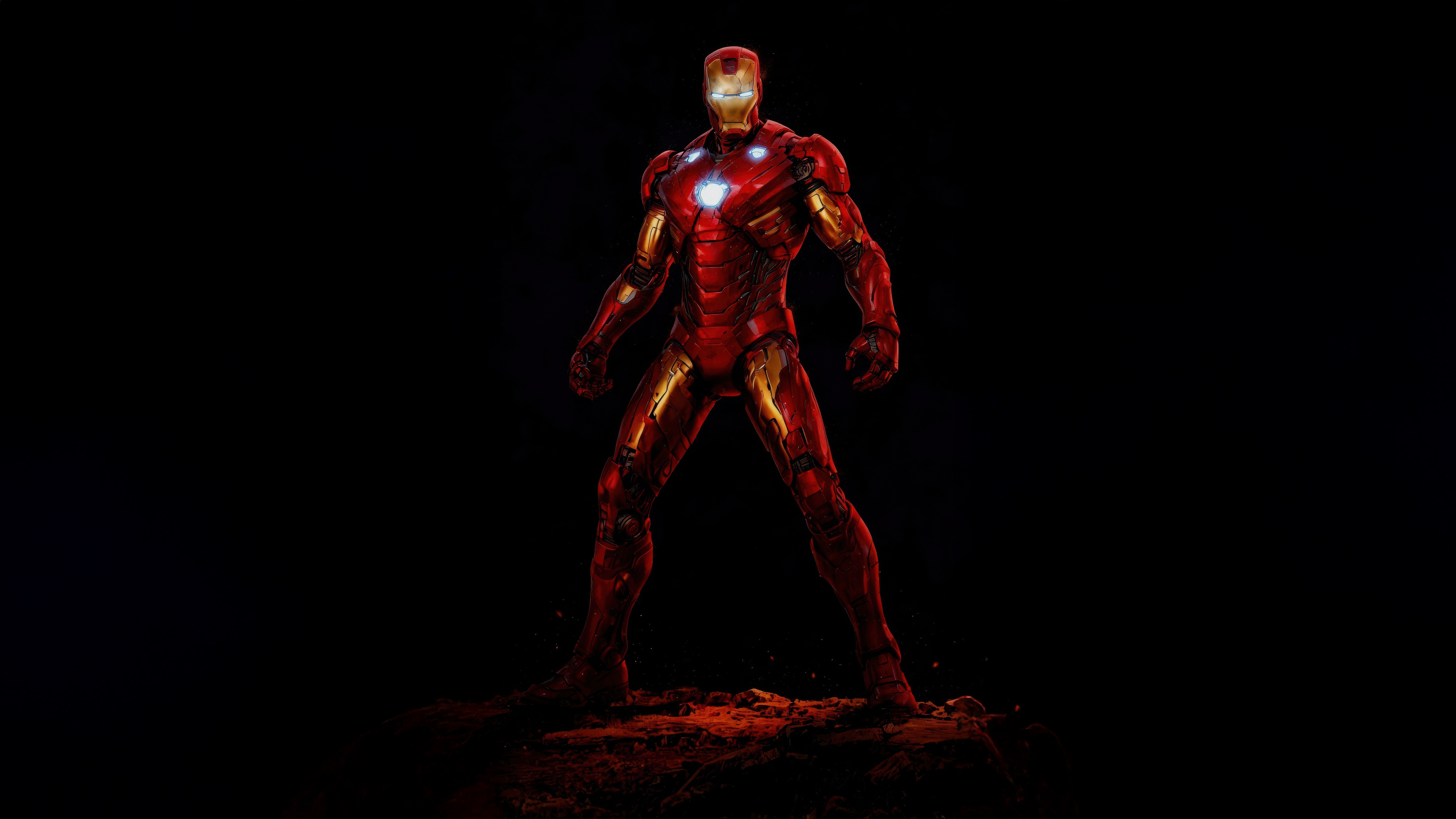 Iron Man standing on a rocky surface HD Wallpaper