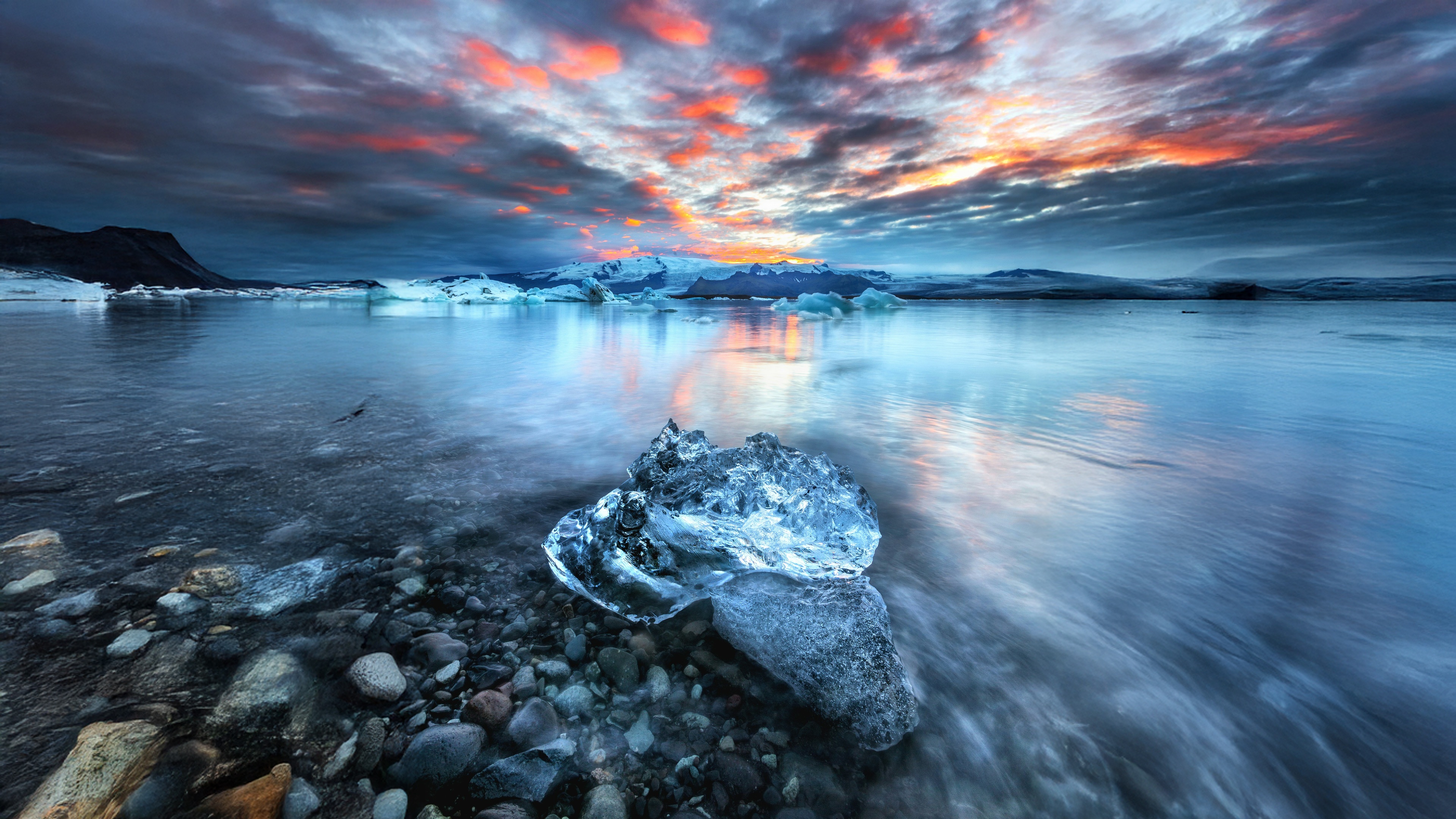 Icebergs on a lake in Iceland at sunset HD Wallpaper