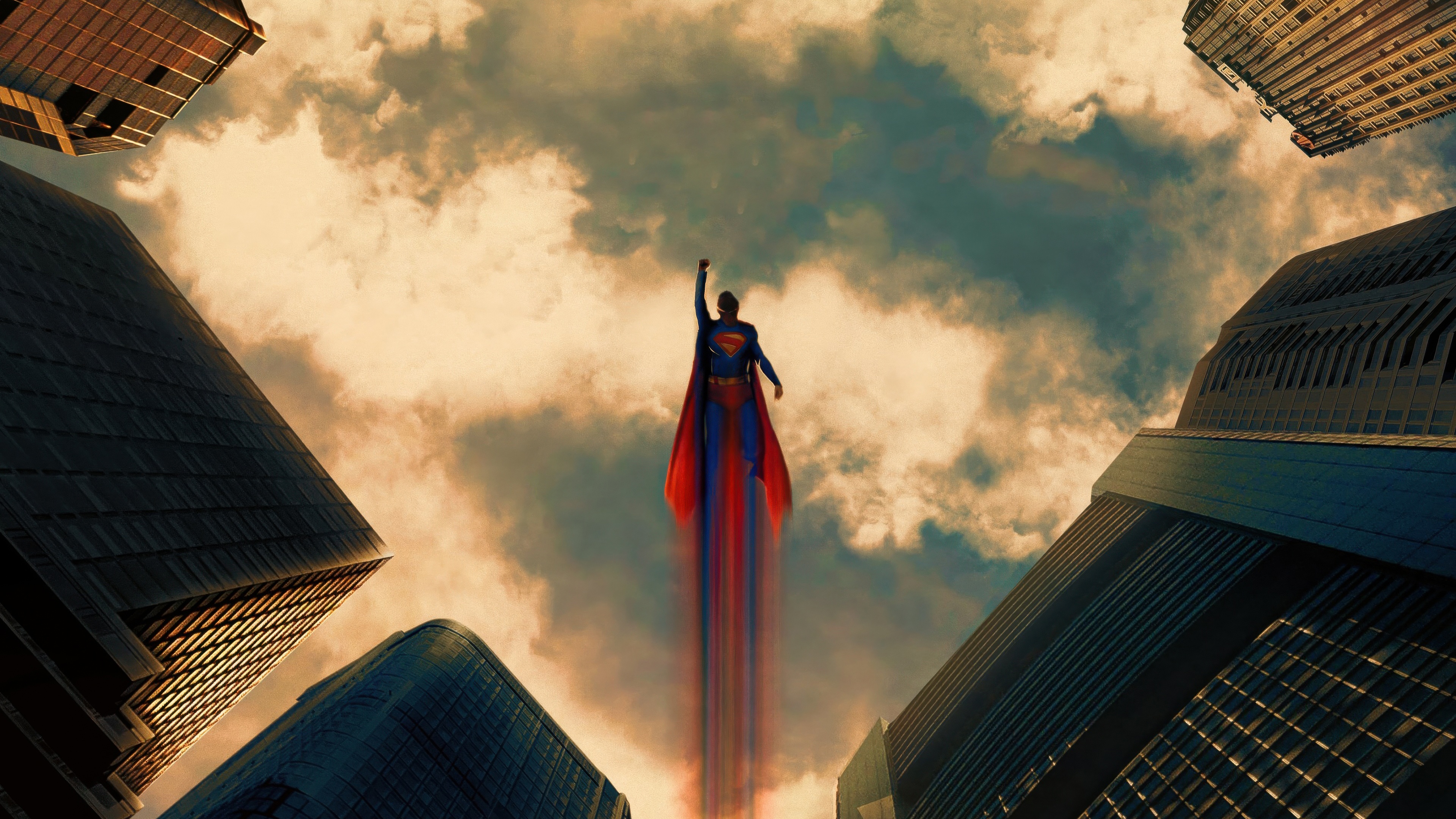 Superman flying upwards between skyscrapers HD Wallpaper