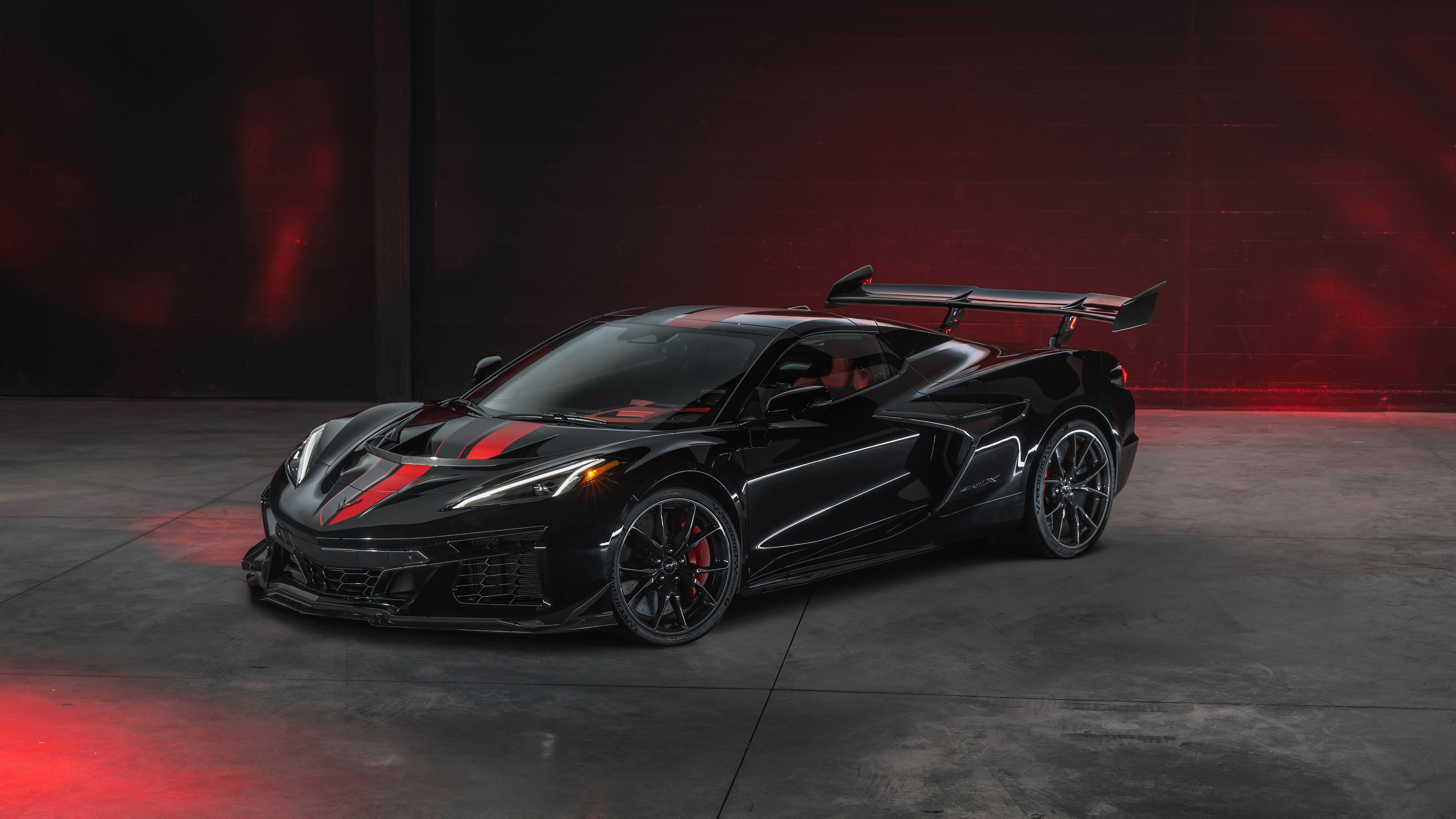 Black 2026 Chevrolet Corvette Zr1x Convertible with Red Stripes HD Wallpaper