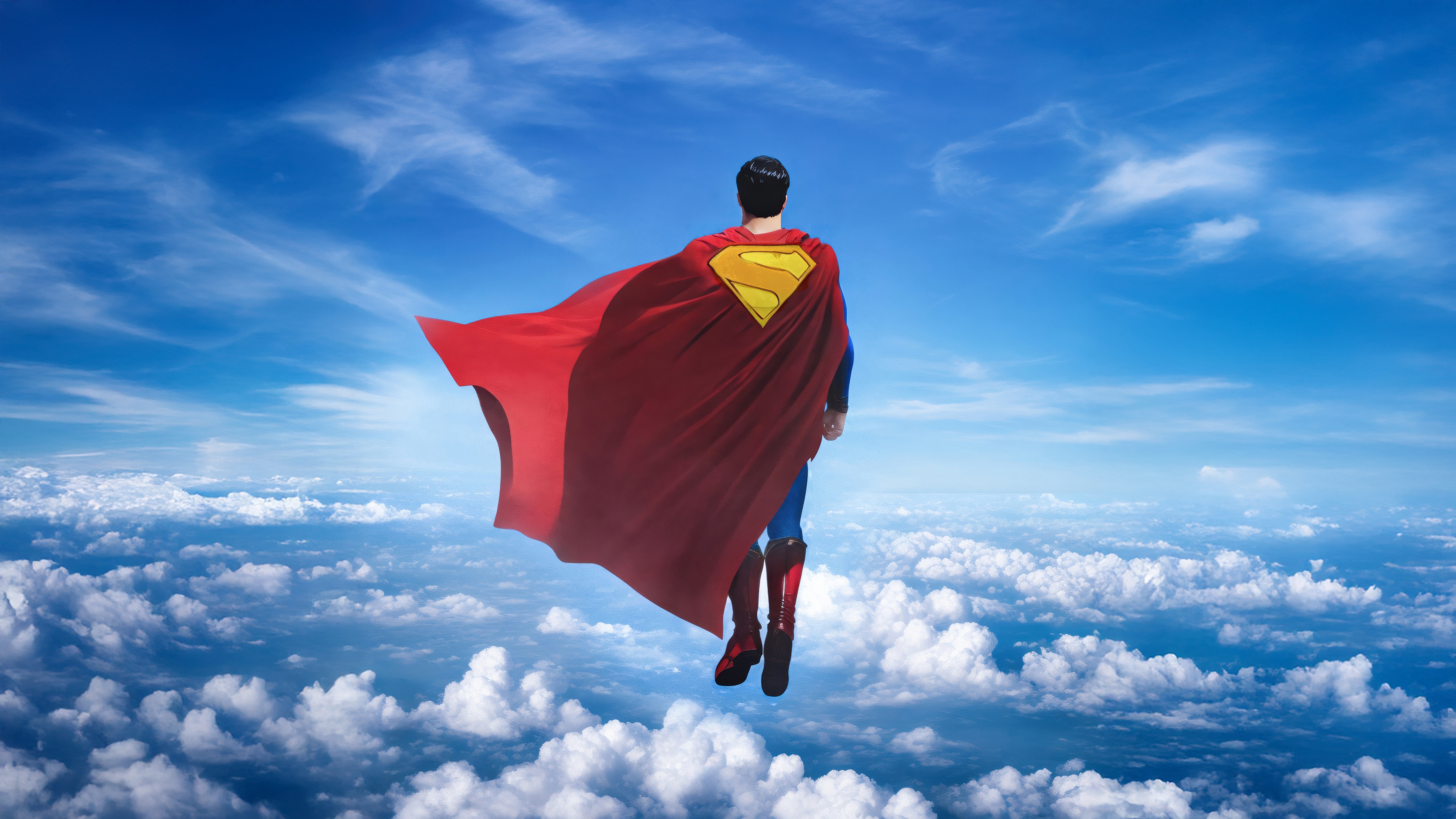 Superman flying through the clouds HD Wallpaper
