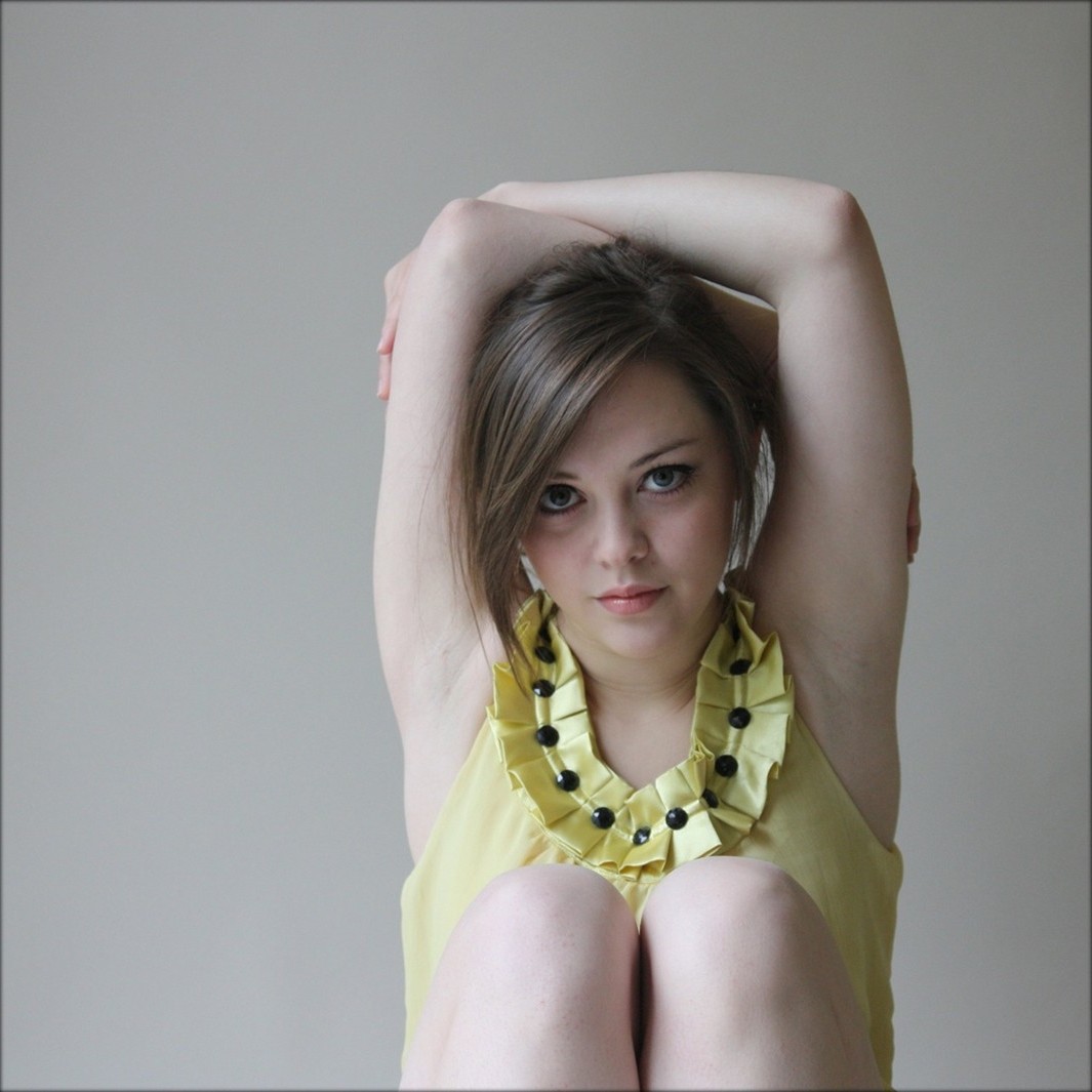 Imogen Dyer with arms raised HD Wallpaper