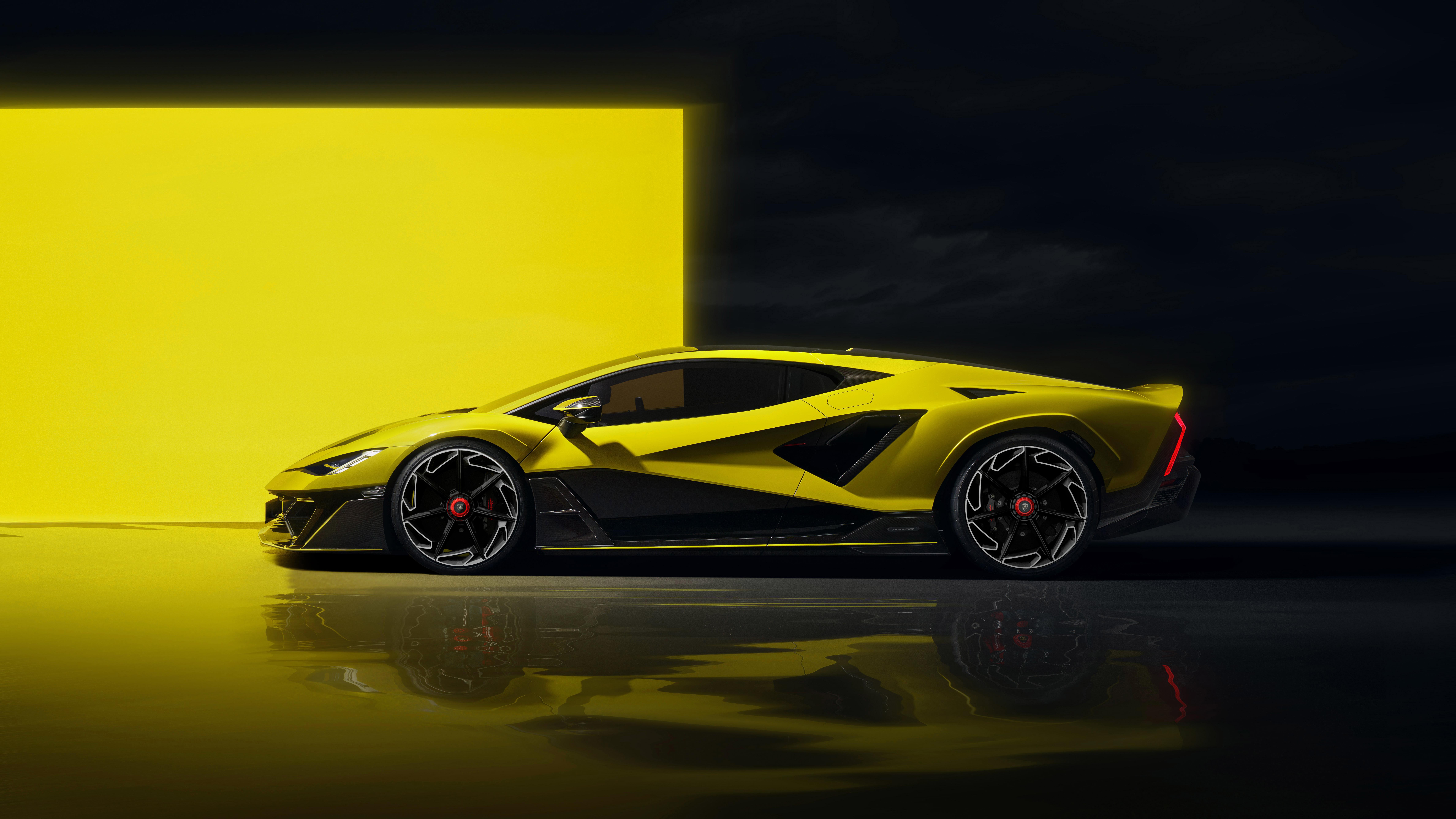 Yellow Lamborghini Fenomeno on a reflective surface HD Wallpaper