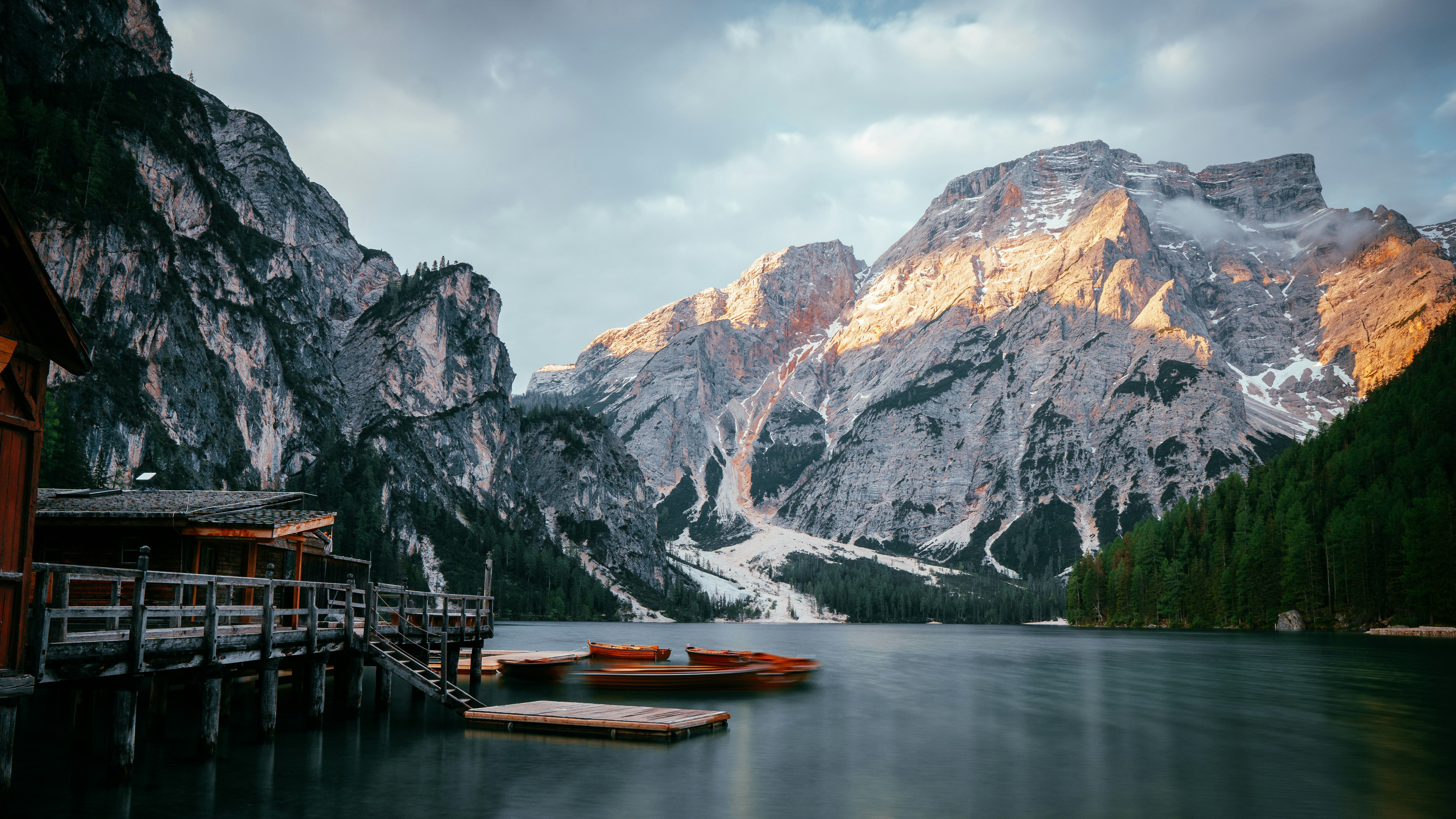 Pragser Wildsee Lake with Wooden Boathouse and Mountains HD Wallpaper