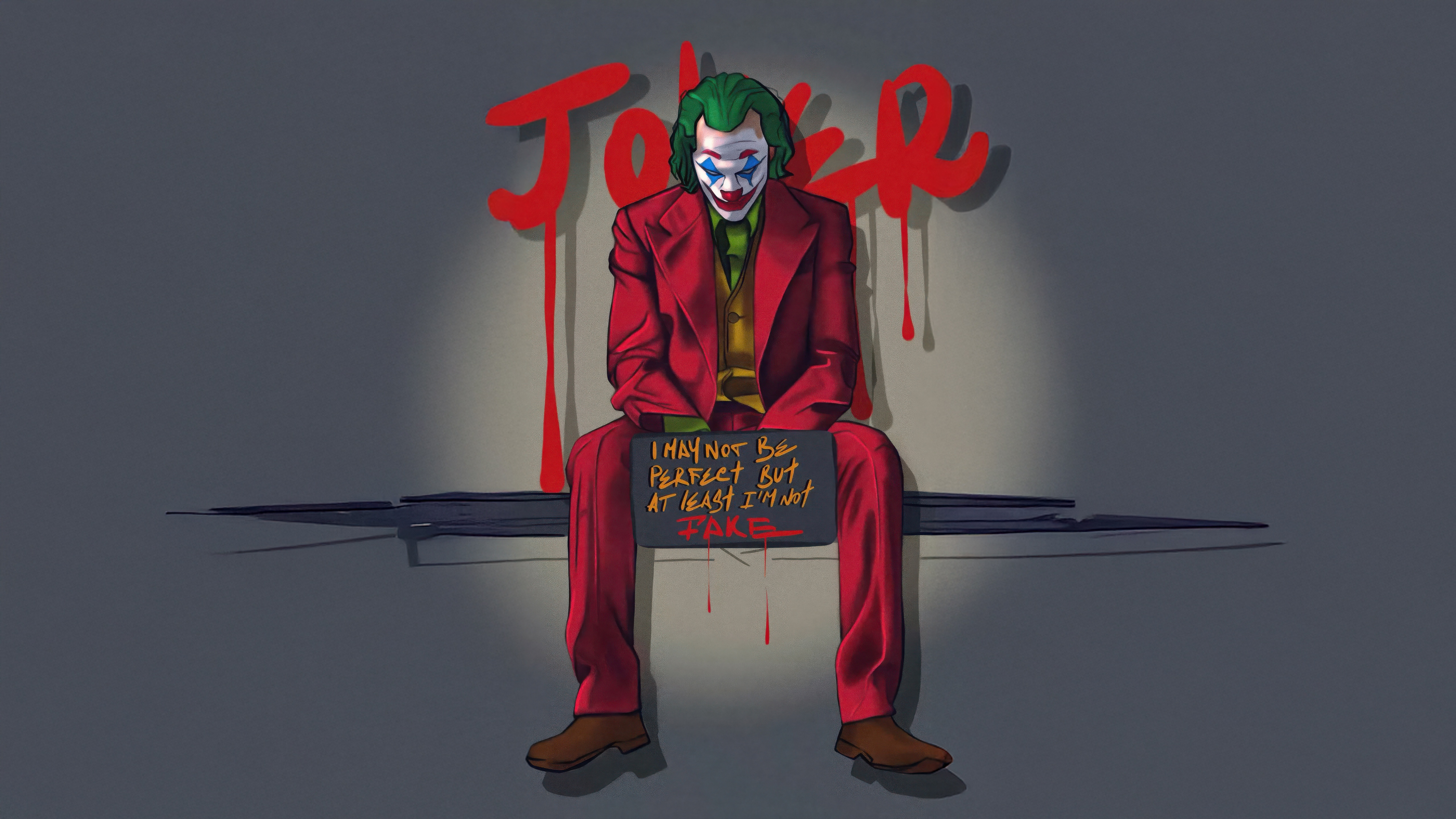 Joker sitting with a sign HD Wallpaper