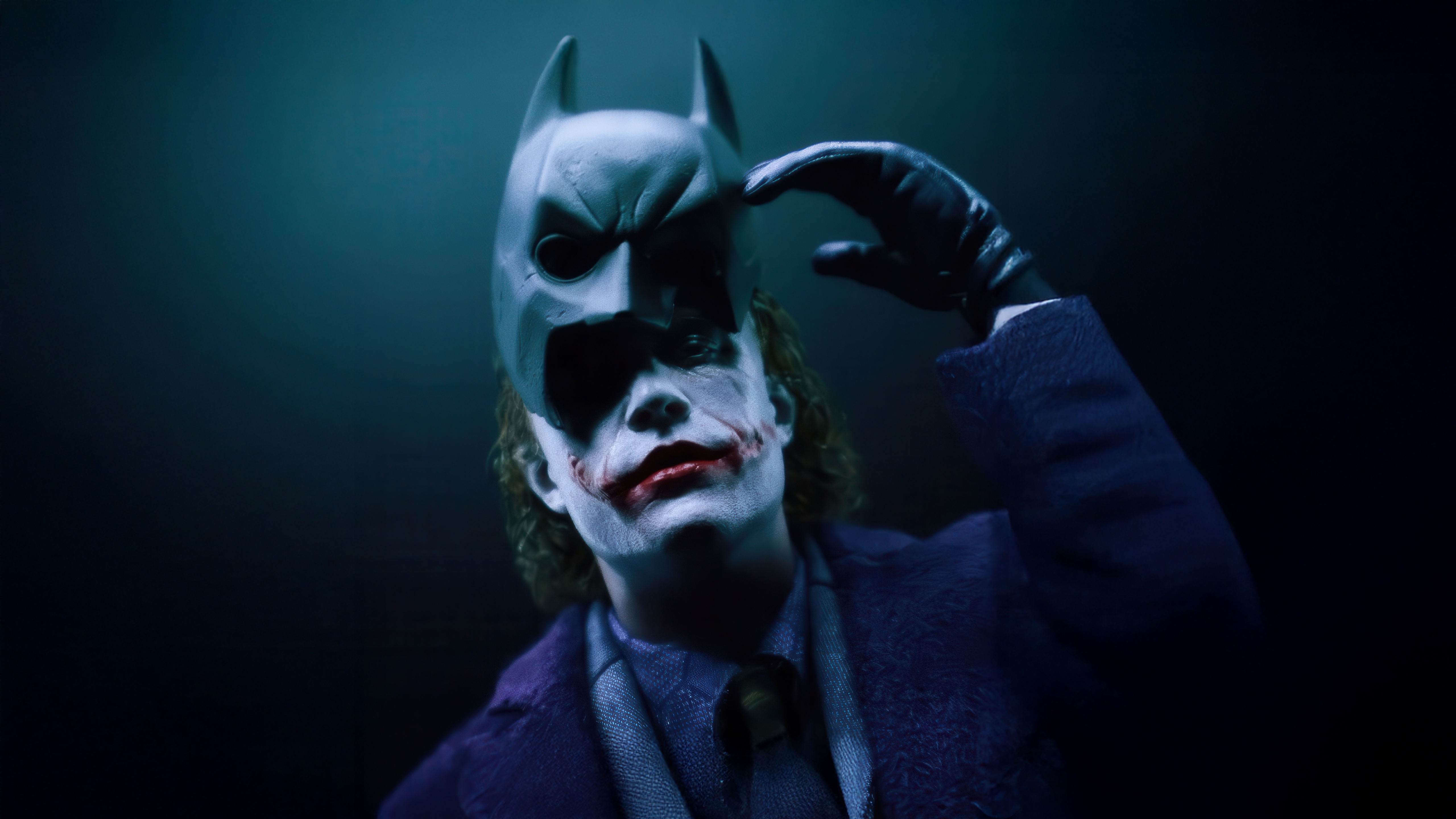 Joker removing Batman mask HD Wallpaper