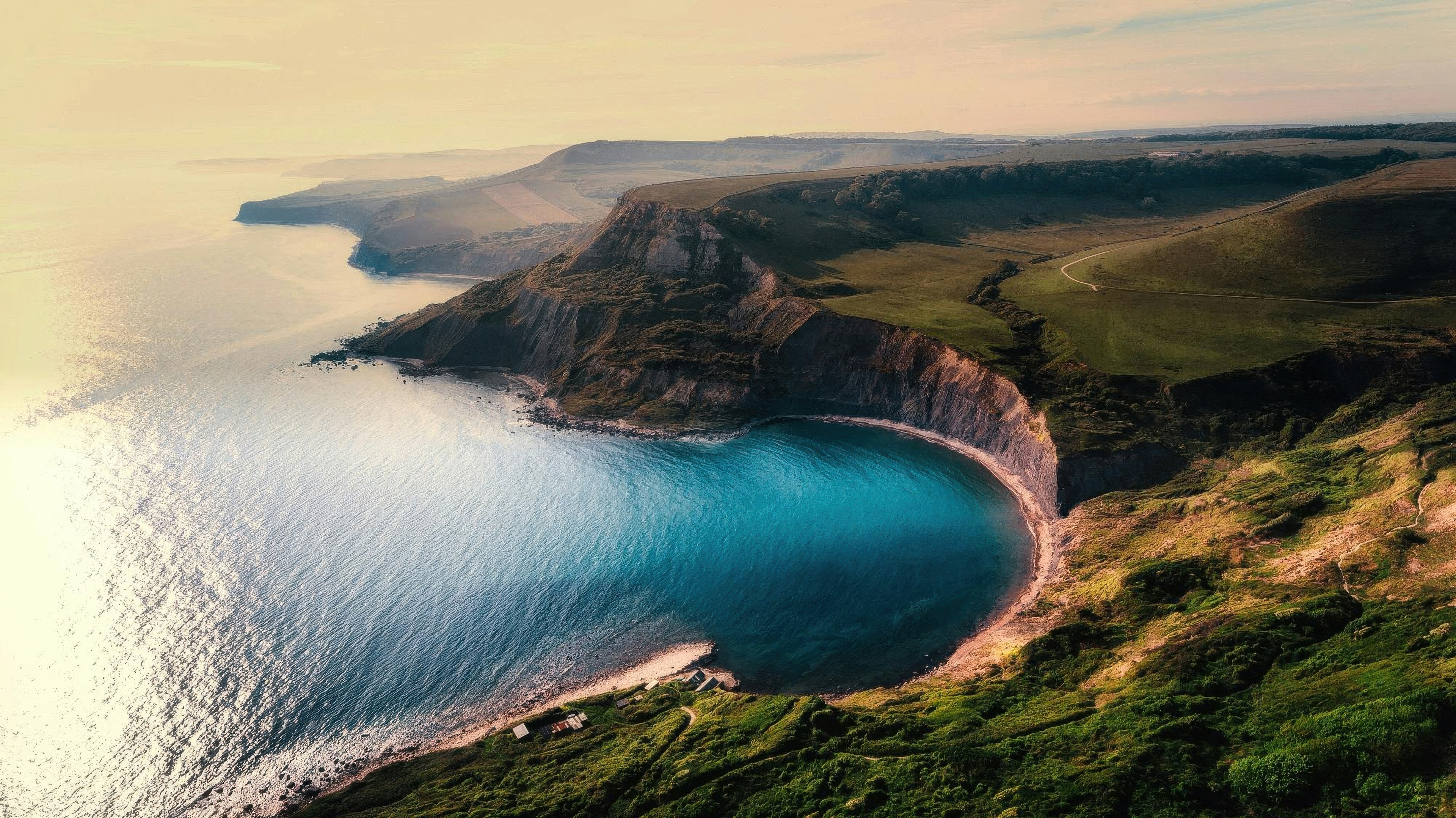 Hidden Turquoise Cove Along Dramatic Cliffs HD Wallpaper