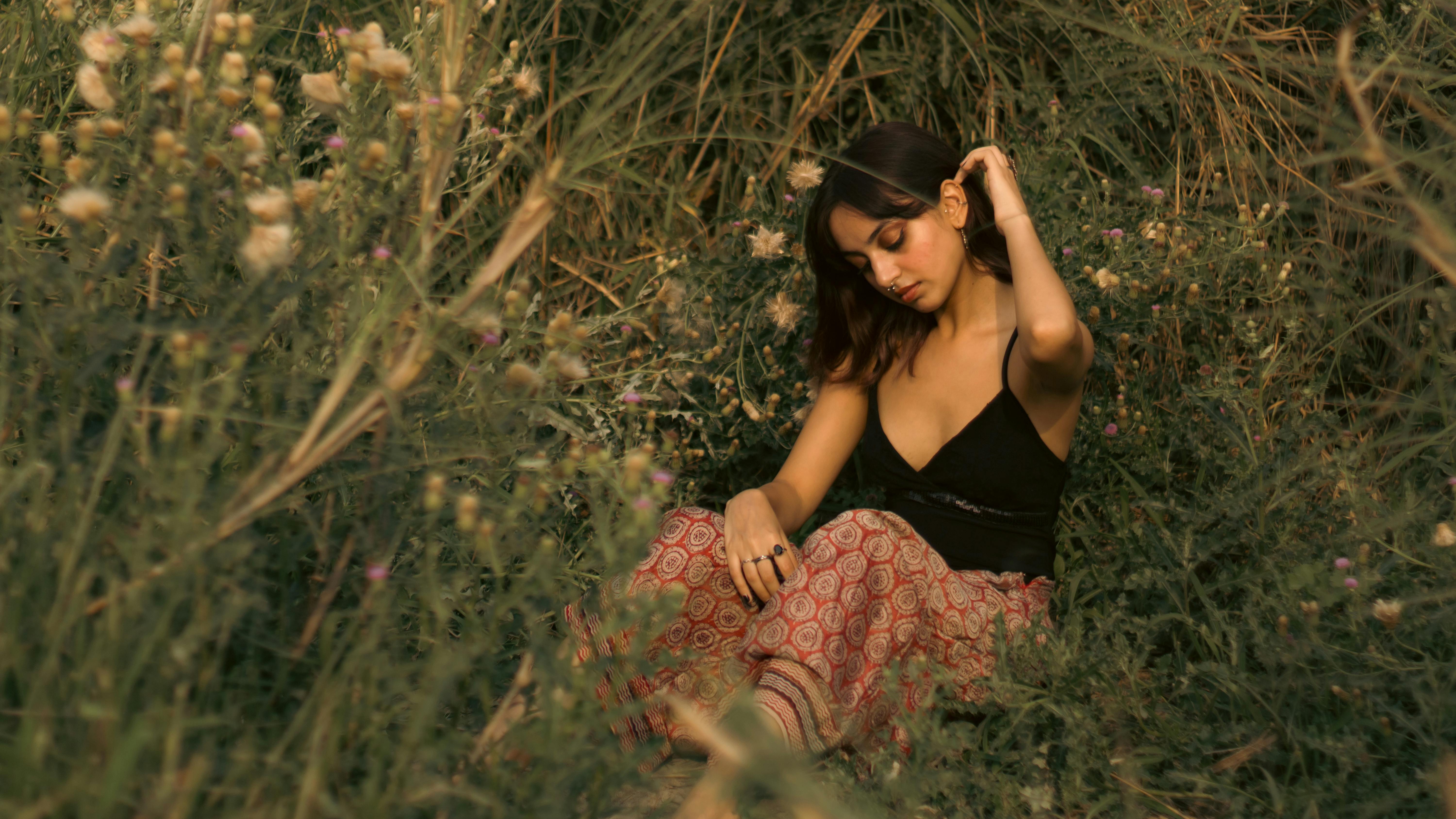 Girl in black in a wildflower field HD Wallpaper