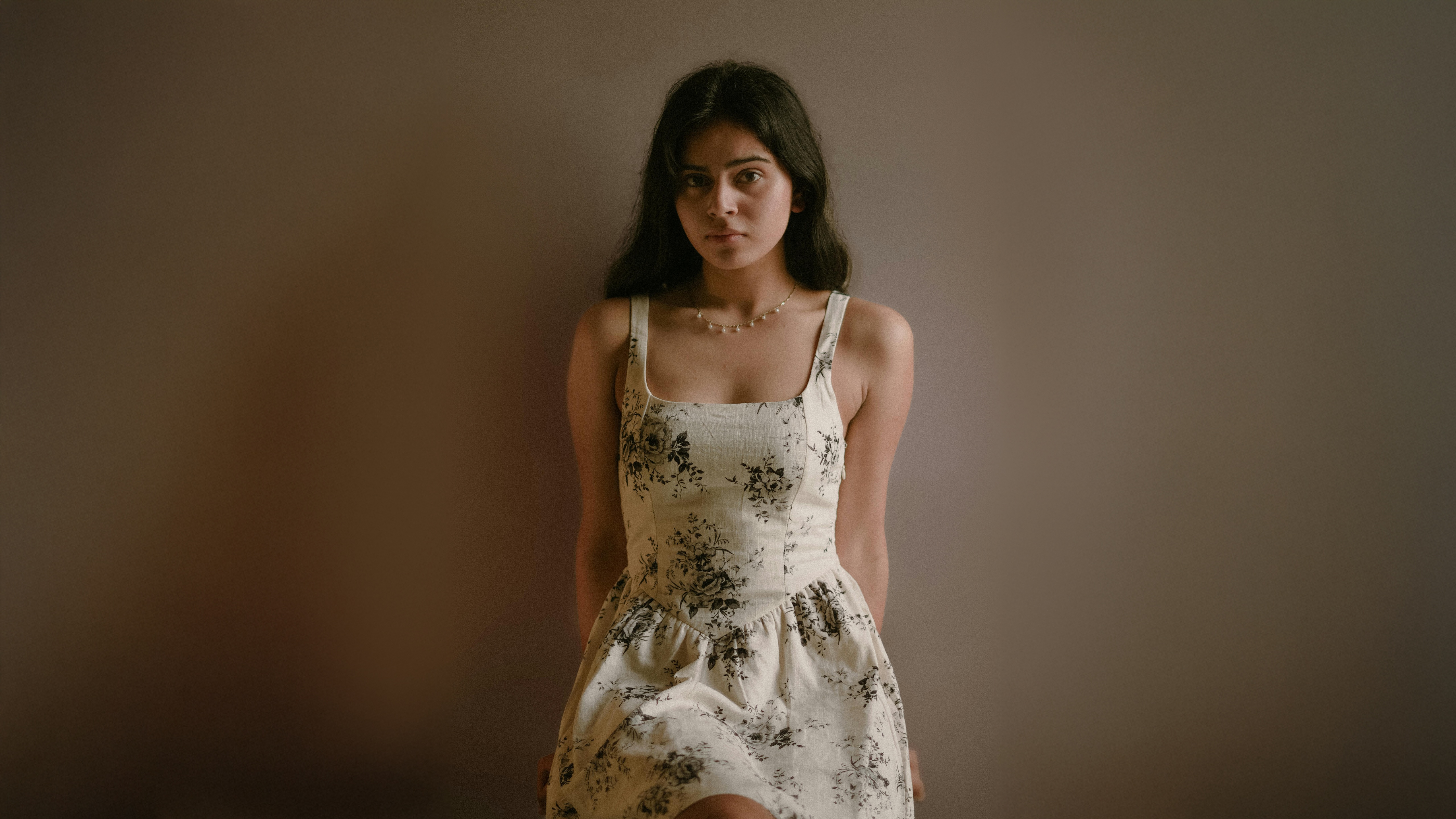 Girl in a floral dress looking at the viewer HD Wallpaper