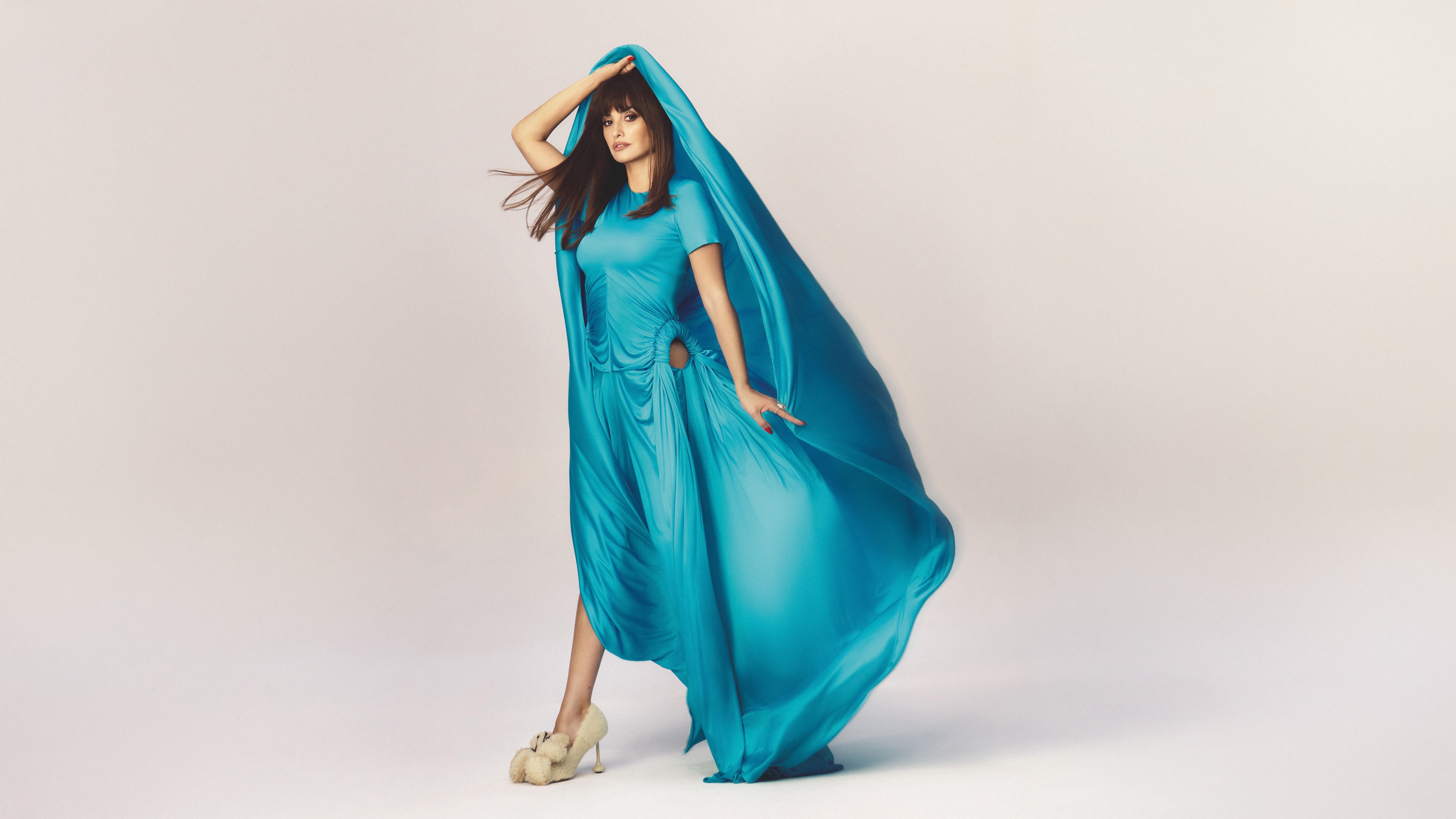 Penelope Cruz in a flowing blue dress for Elle España HD Wallpaper