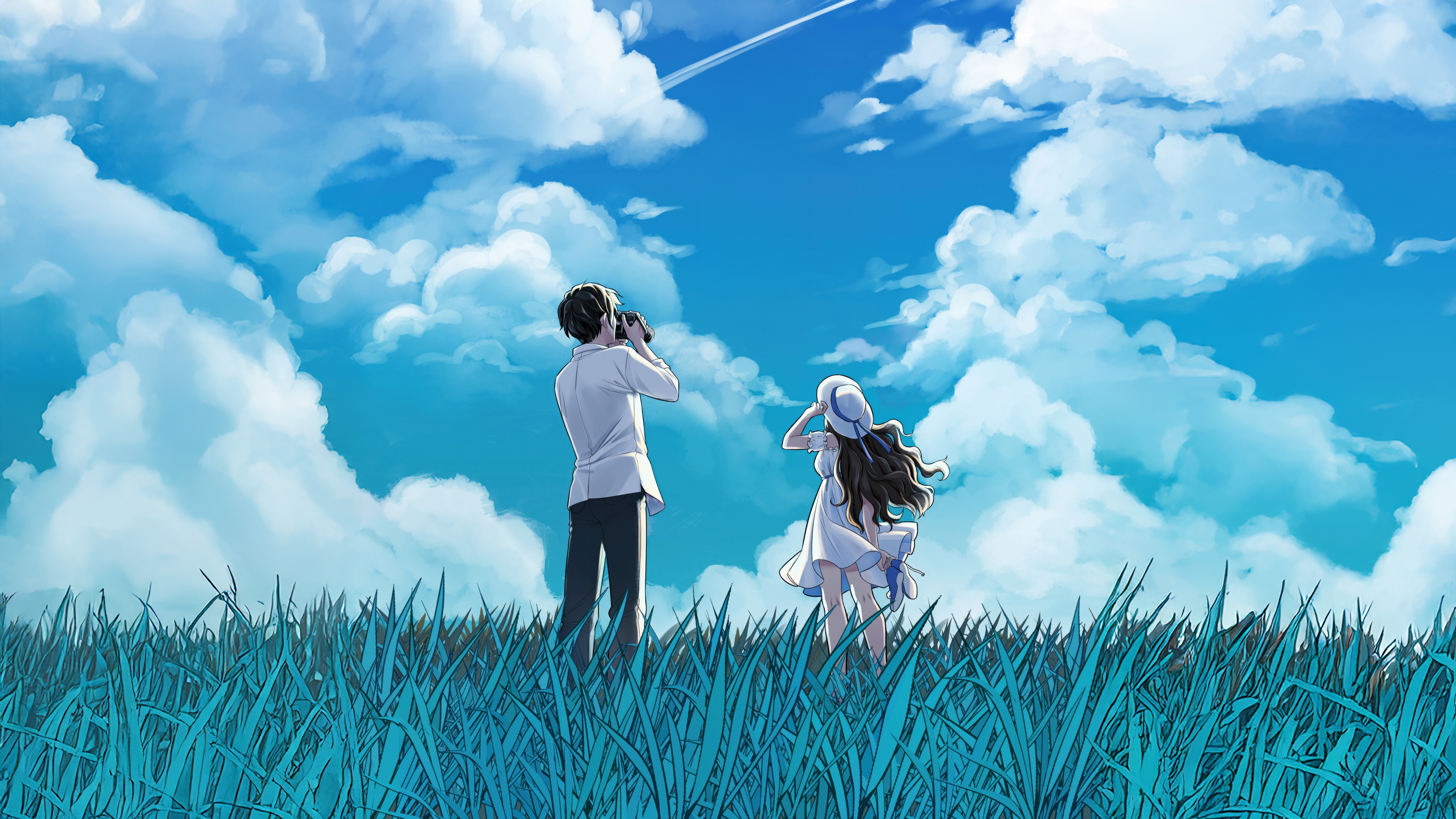 Couple in a field under a cloudy sky HD Wallpaper
