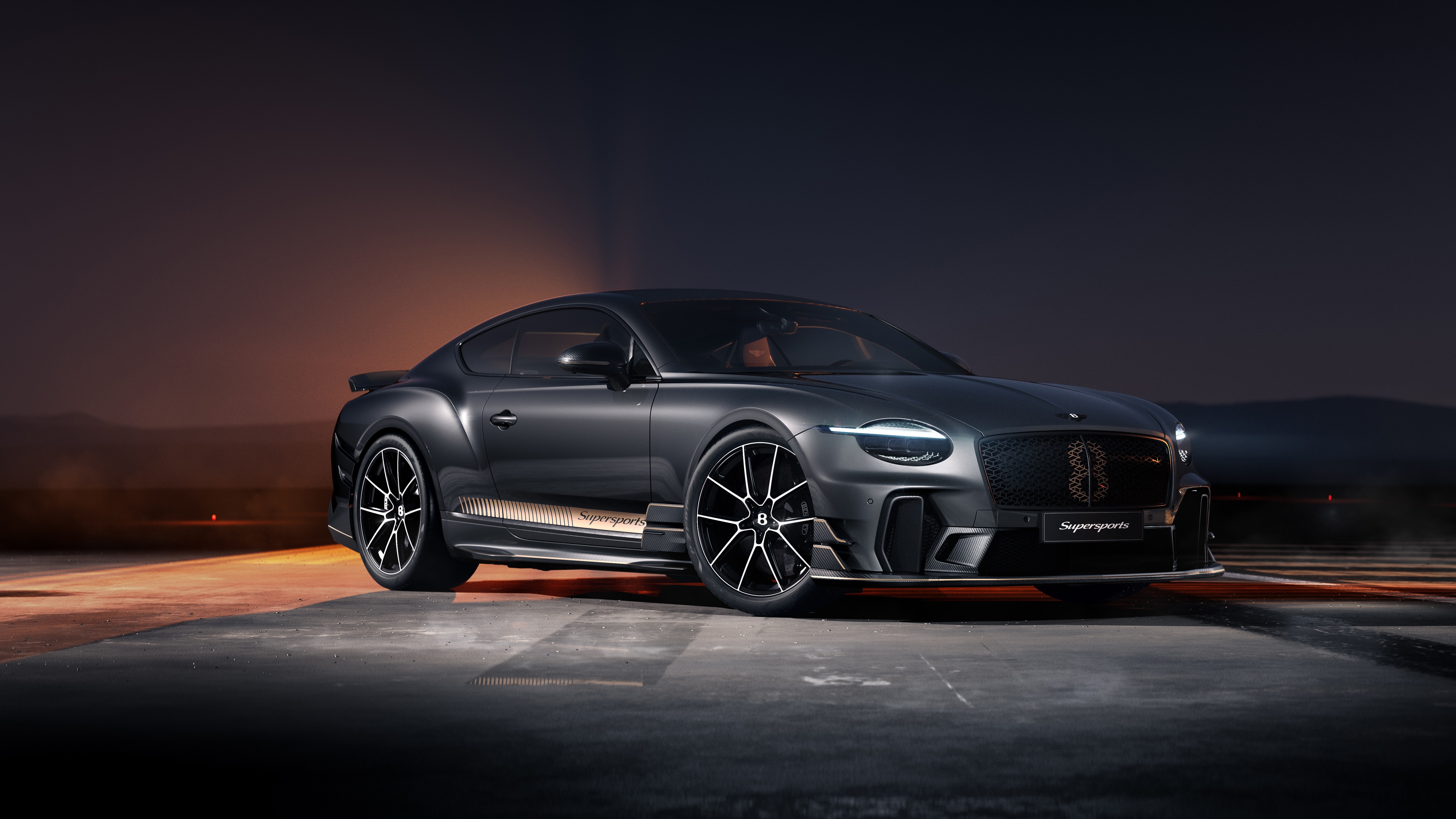 Bentley Continental GT Supersports on a dark road HD Wallpaper
