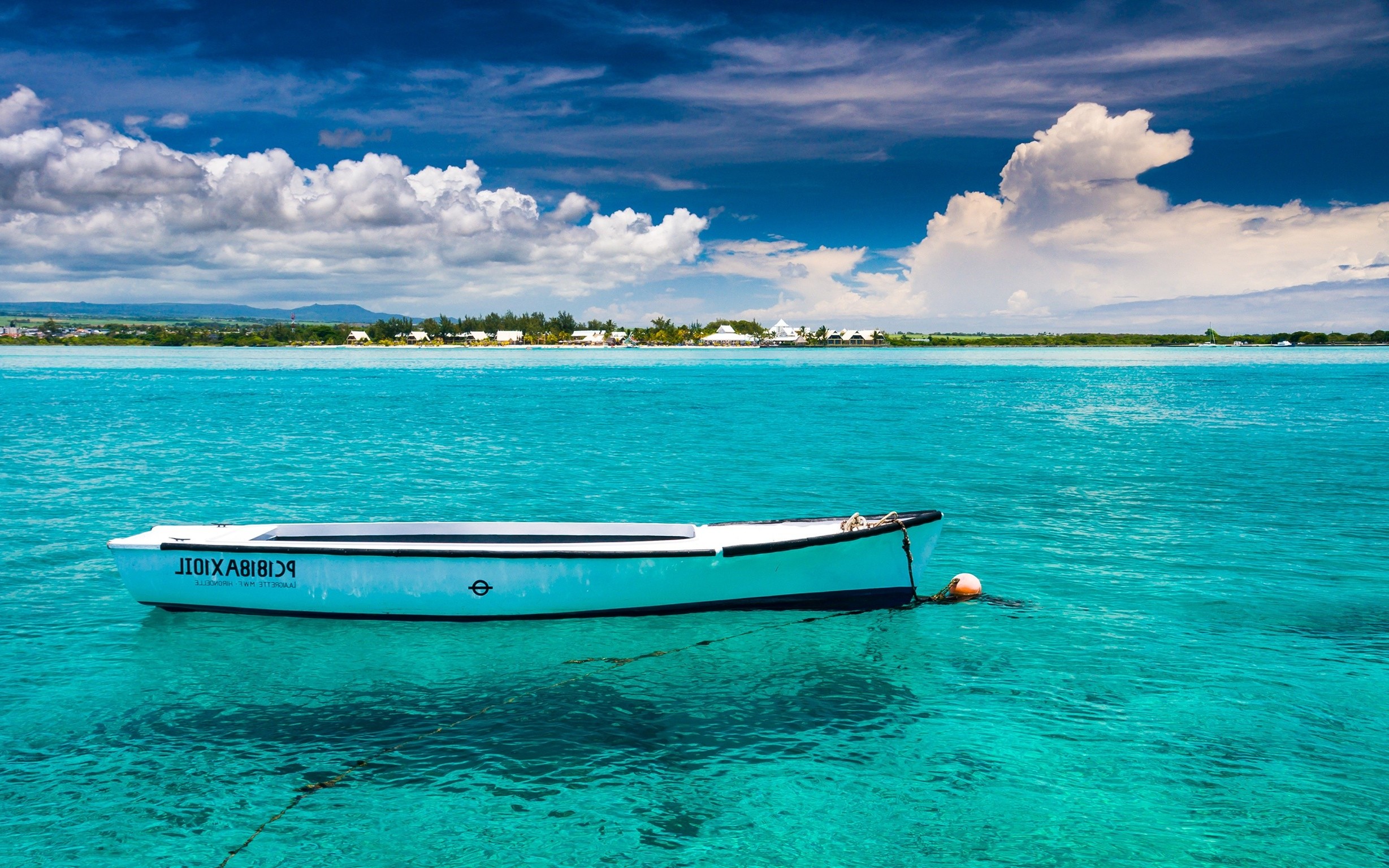 Boat on turquoise water near island with clouds HD Wallpaper