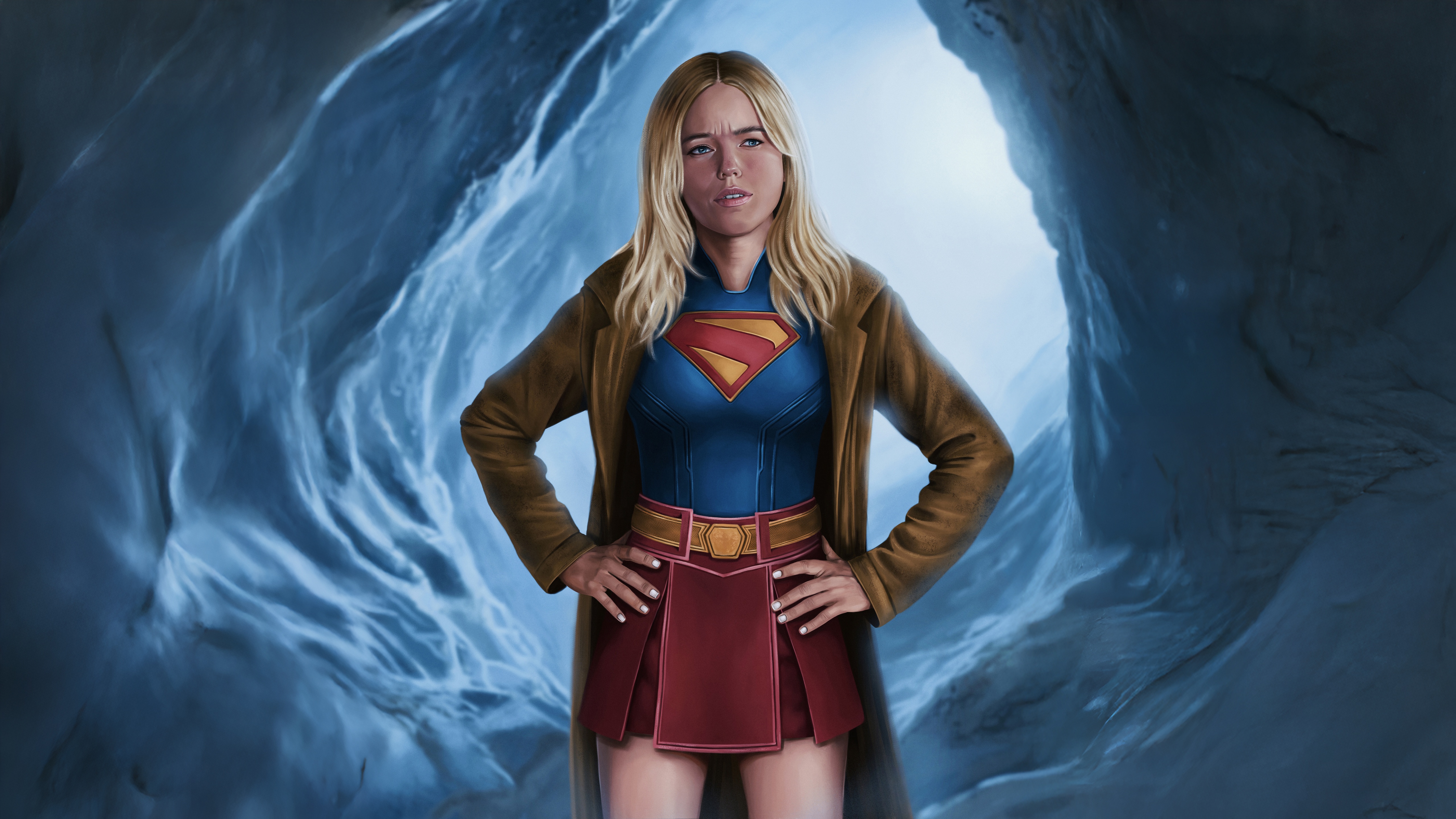 Supergirl Milly Alcock in a blue costume HD Wallpaper