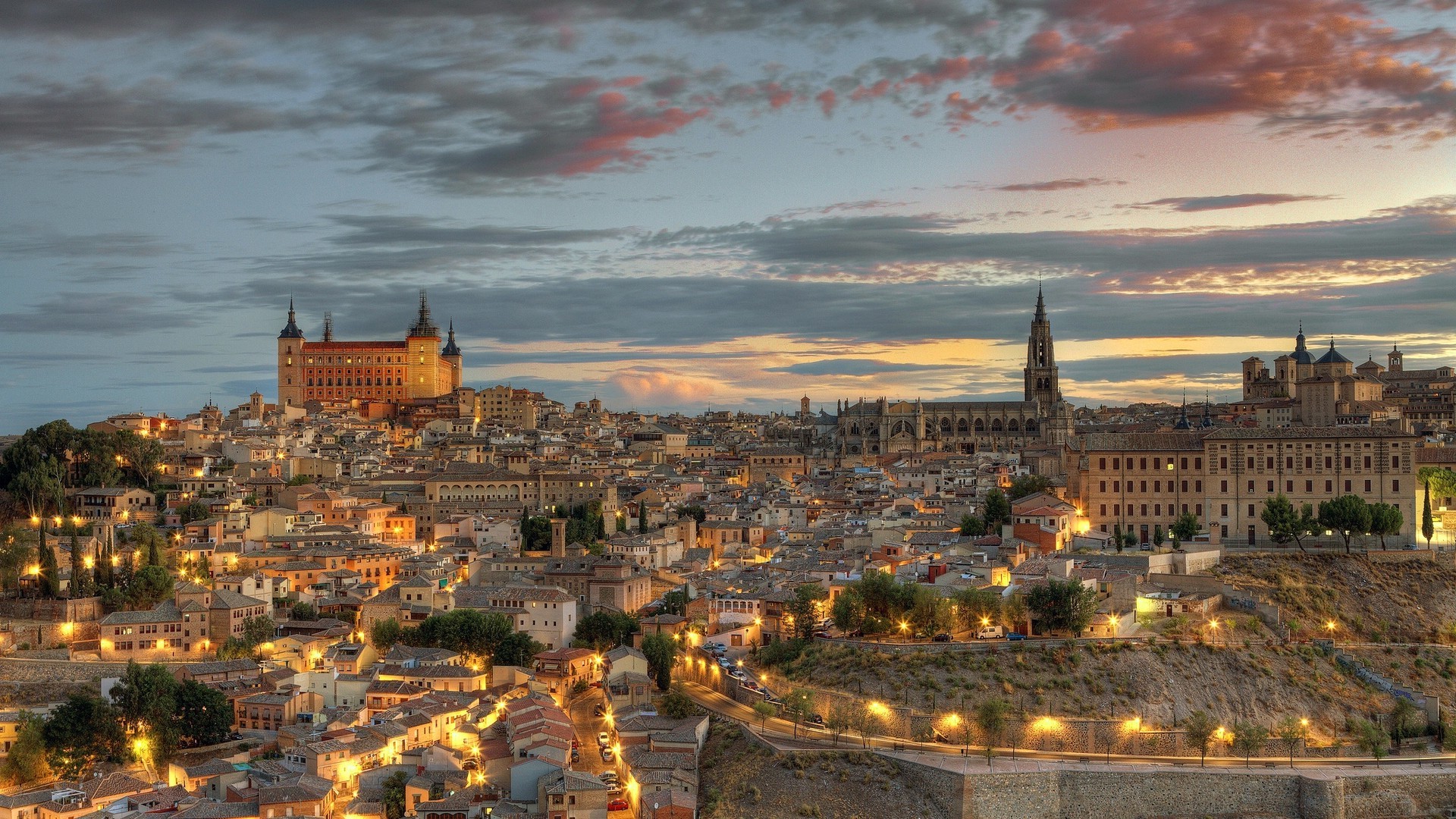 Toledo Spain cityscape with historic buildings at dusk HD Wallpaper