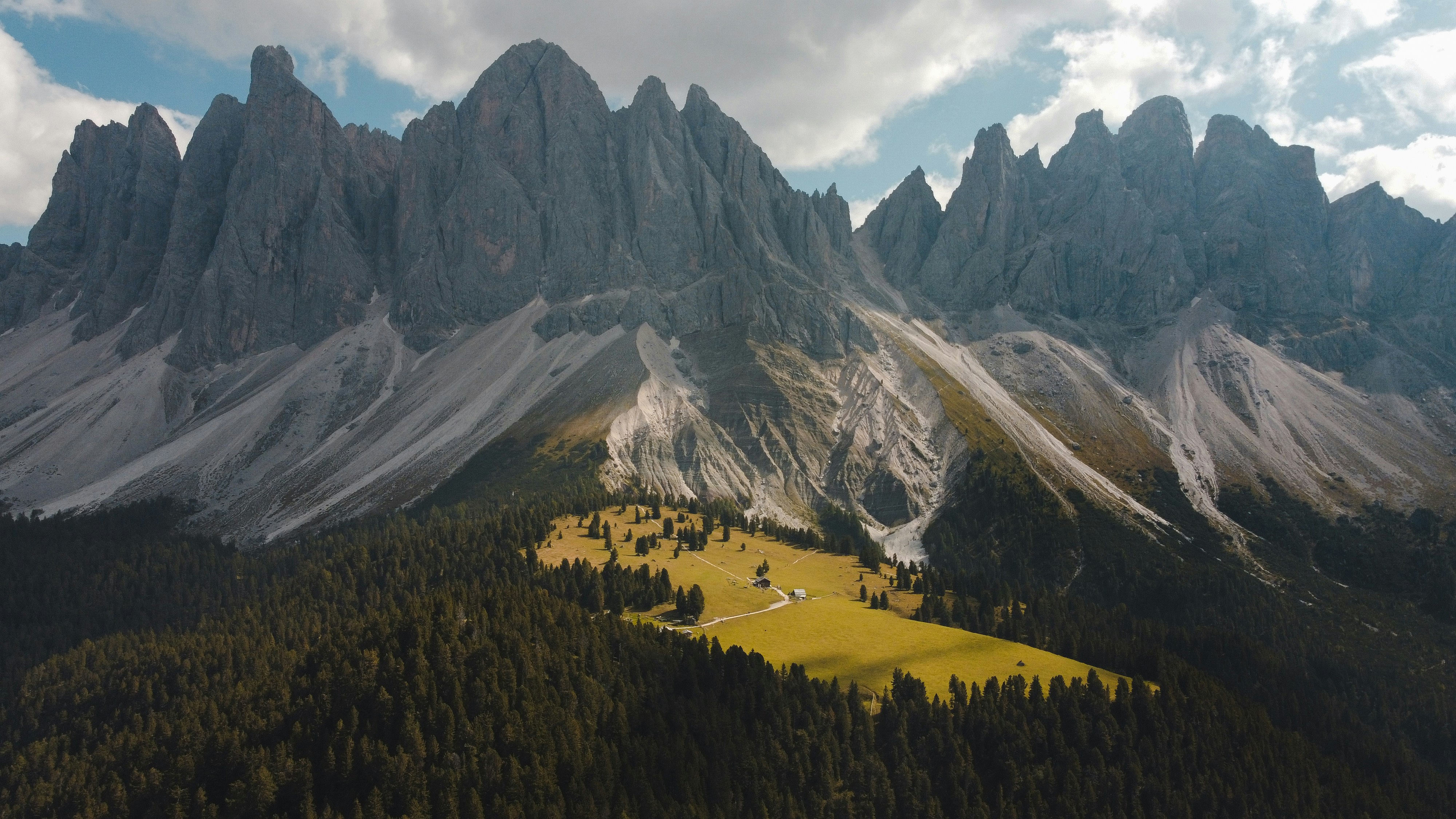 Puez Odle Nature Park mountain range with green meadow HD Wallpaper