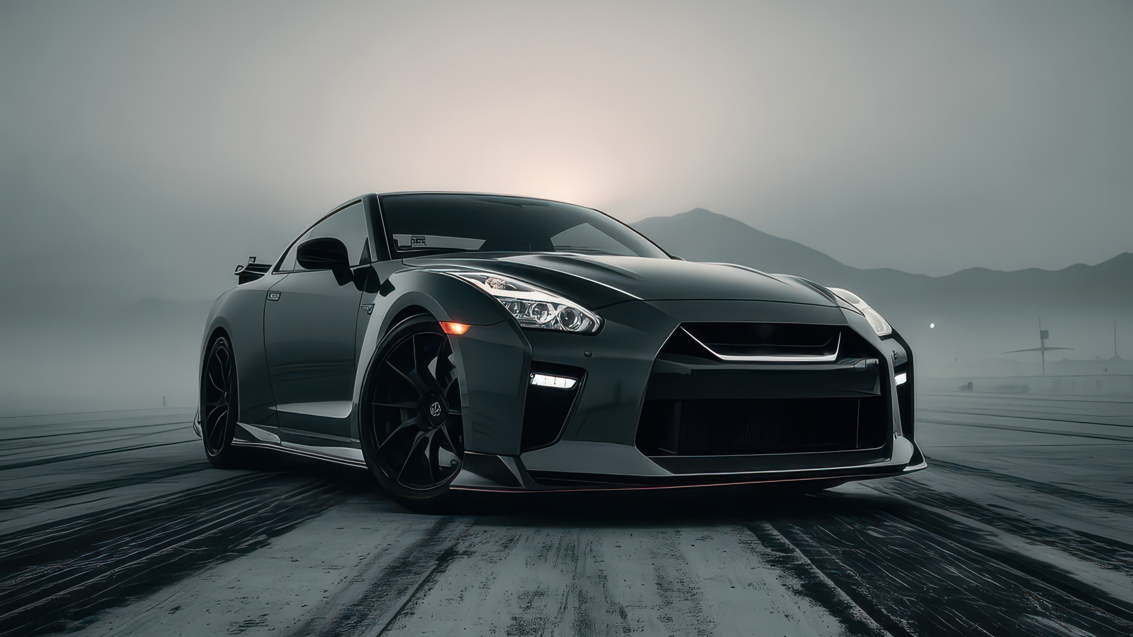 Nissan GTR on a misty road HD Wallpaper