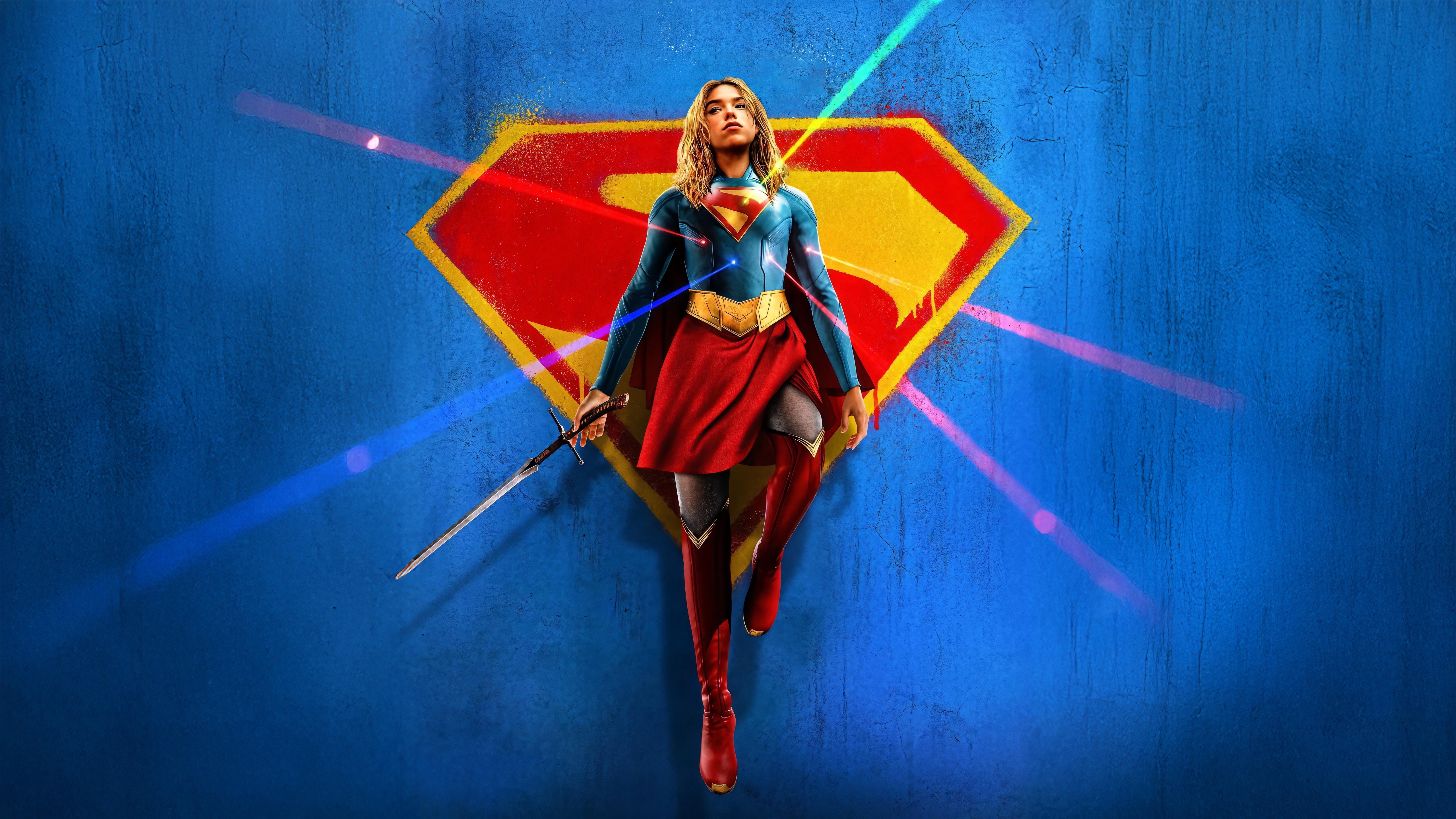 Supergirl Standing in Front of Superman Logo HD Wallpaper
