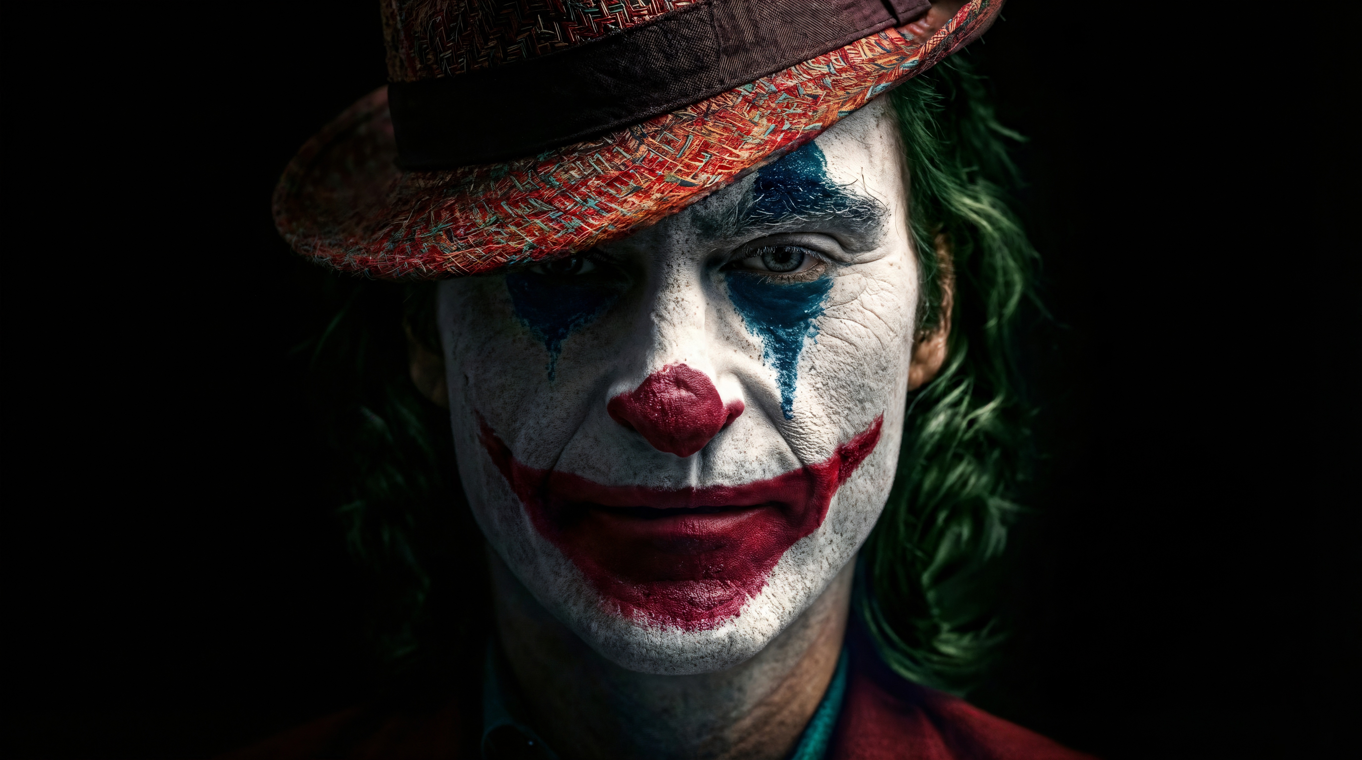 Joker wearing a hat HD Wallpaper