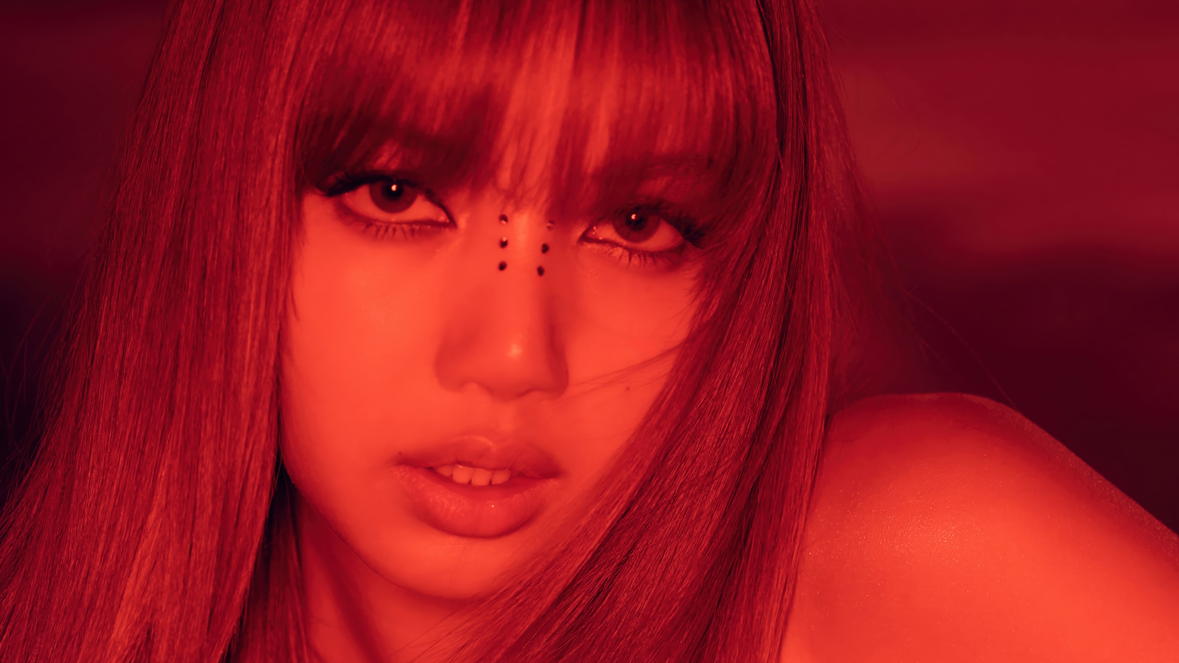 Lisa from BLACKPINK in red lighting 4K HD Wallpaper