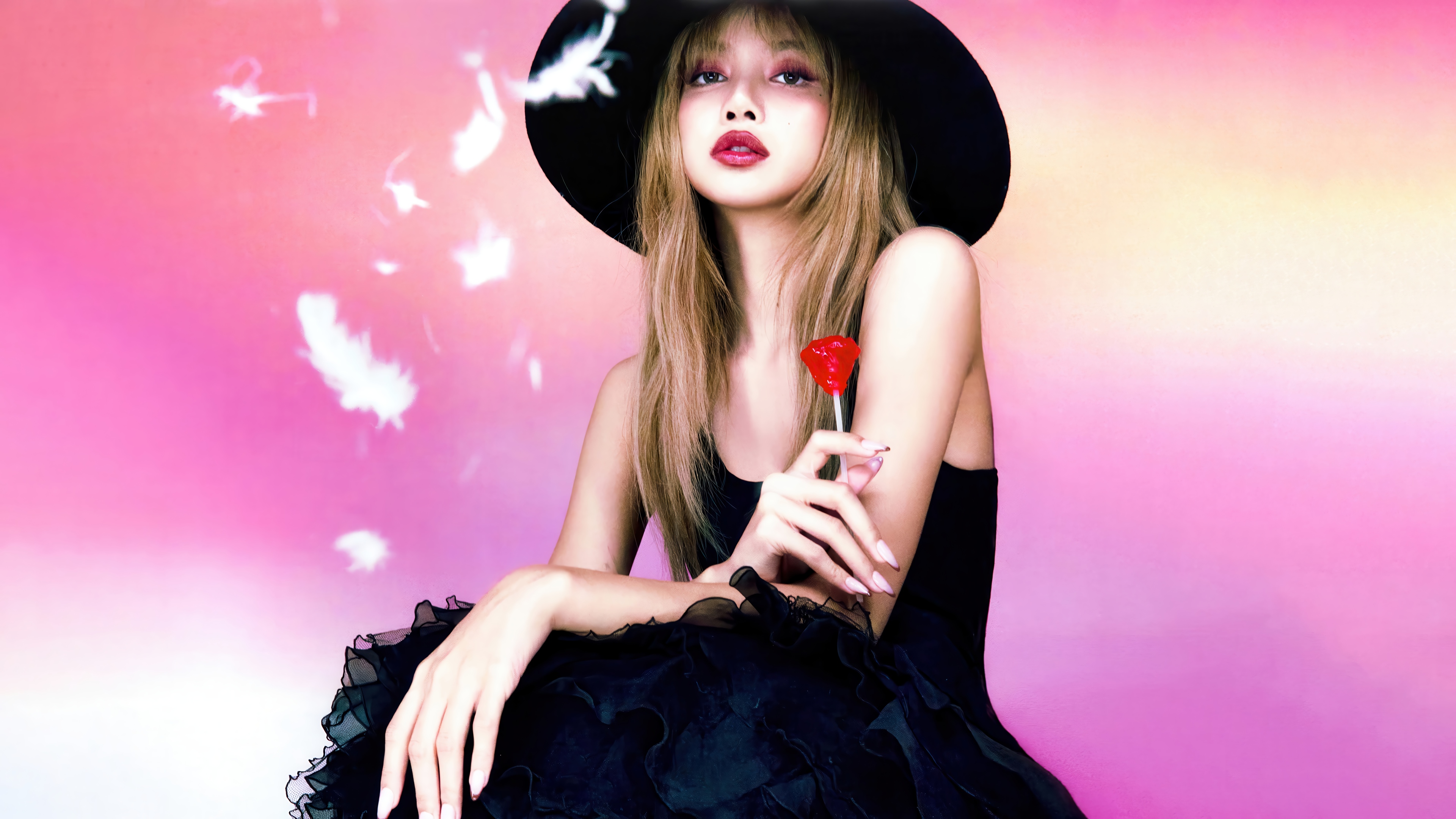 Lisa from BLACKPINK with a lollipop HD Wallpaper