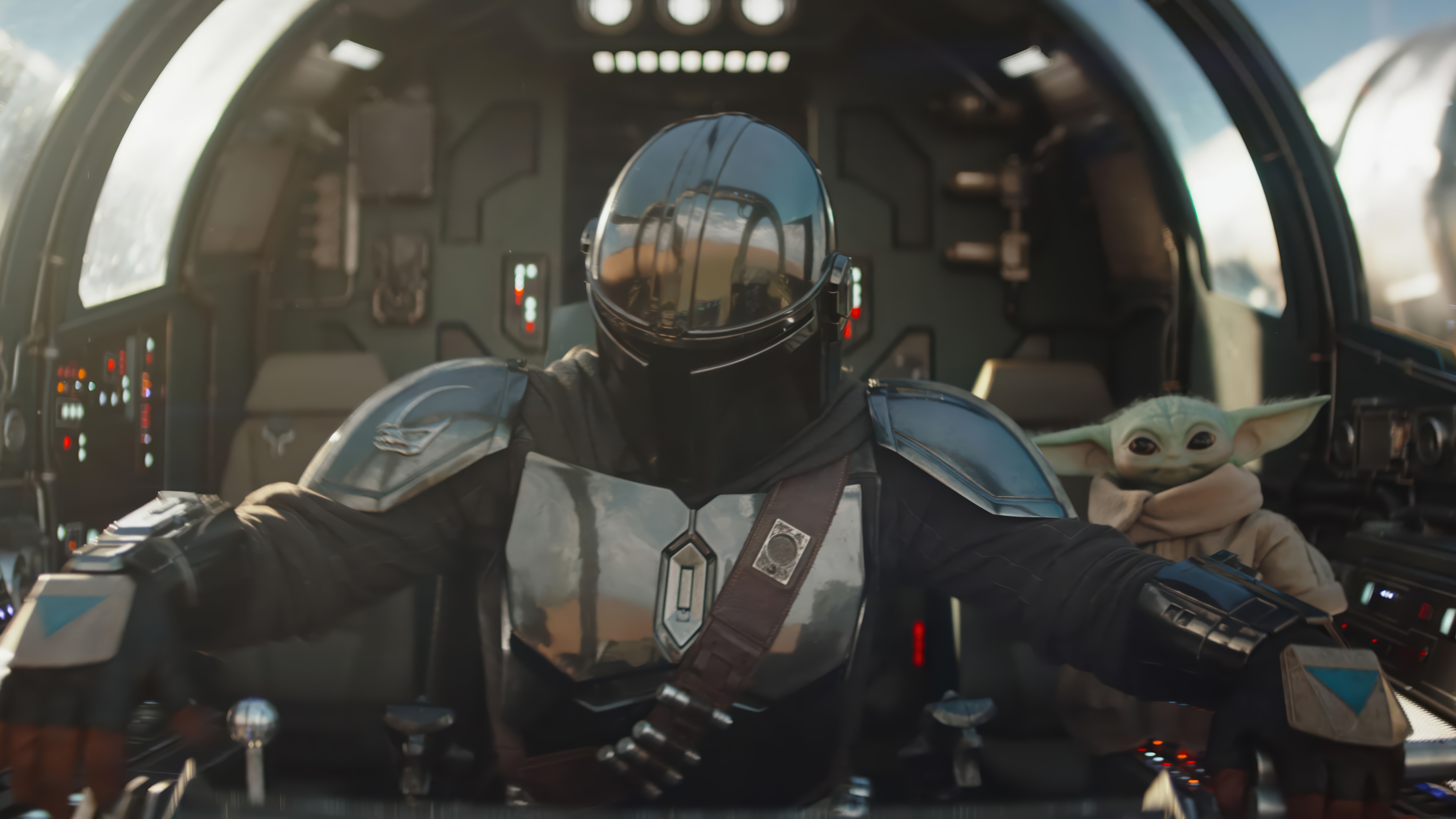 The Mandalorian and Grogu in a spaceship cockpit 4K HD Wallpaper