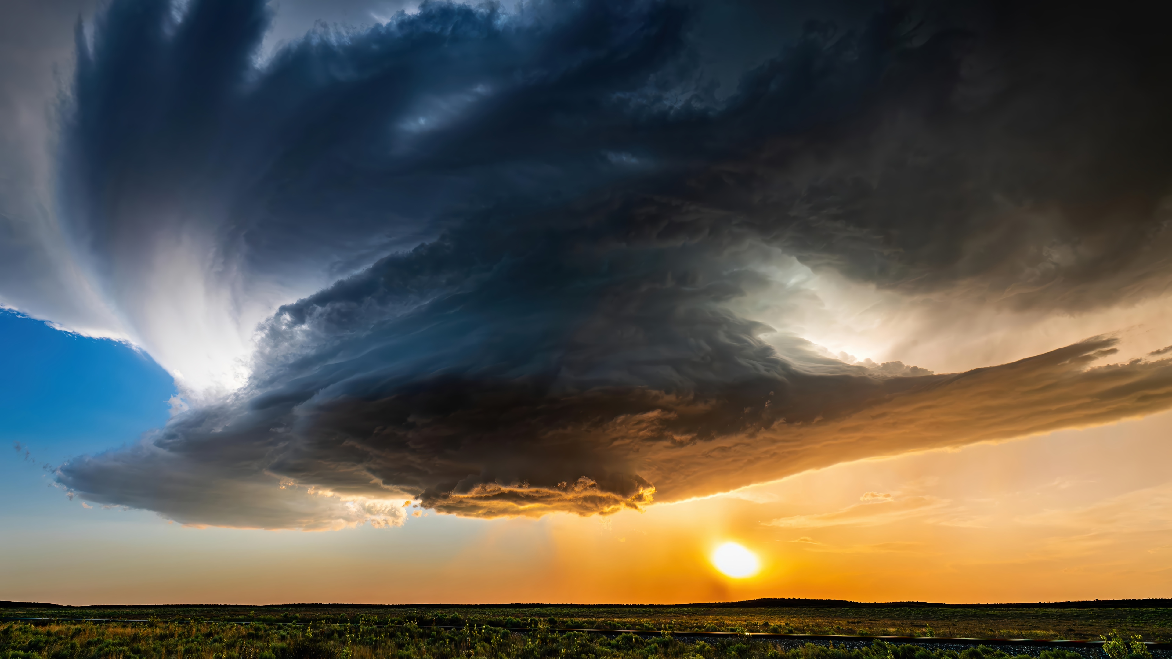 Stormy Sky Over a Field at Sunset 4K HD Wallpaper