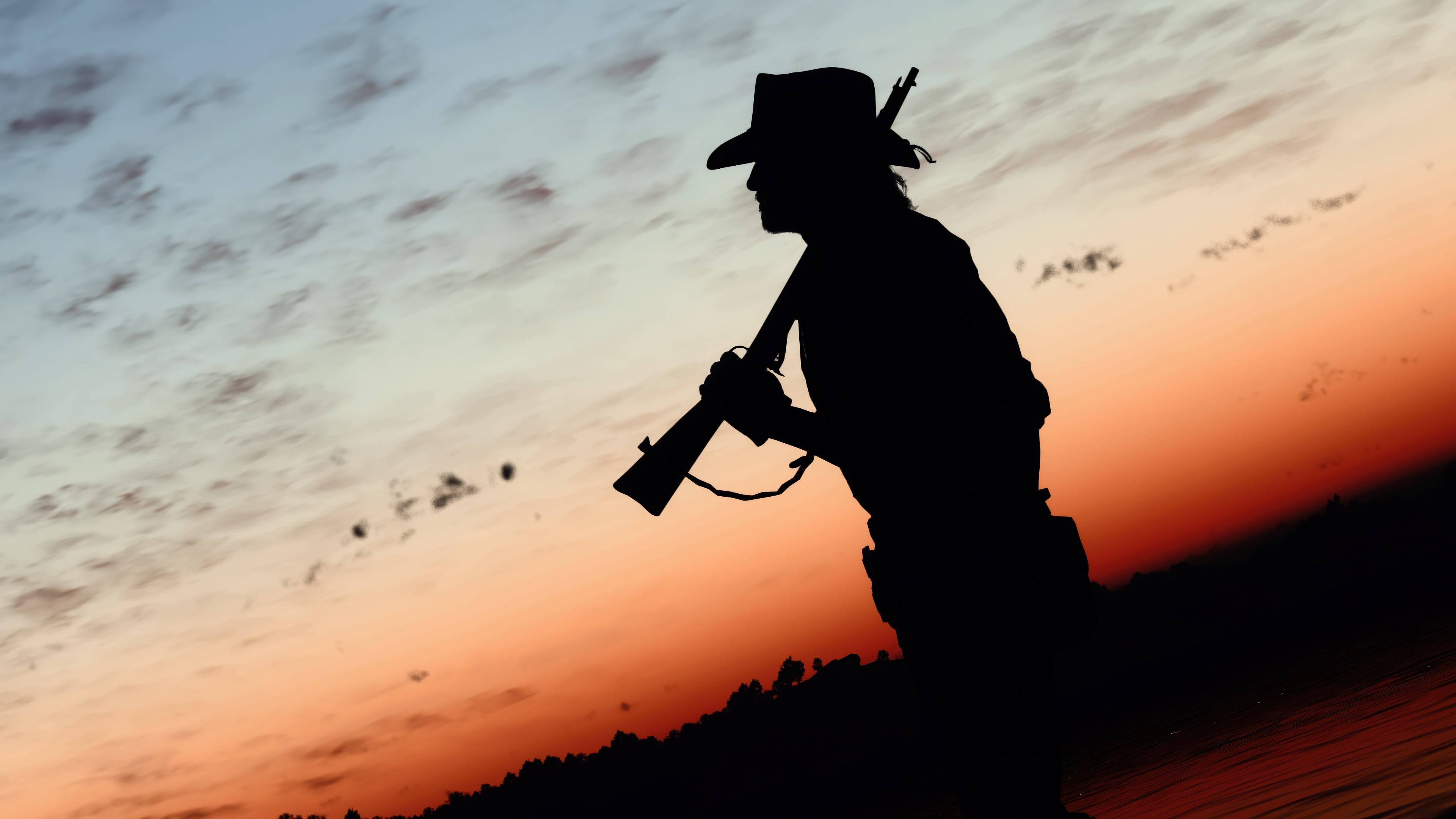 Red Dead Redemption 2 Silhouette with Rifle at Sunset HD Wallpaper