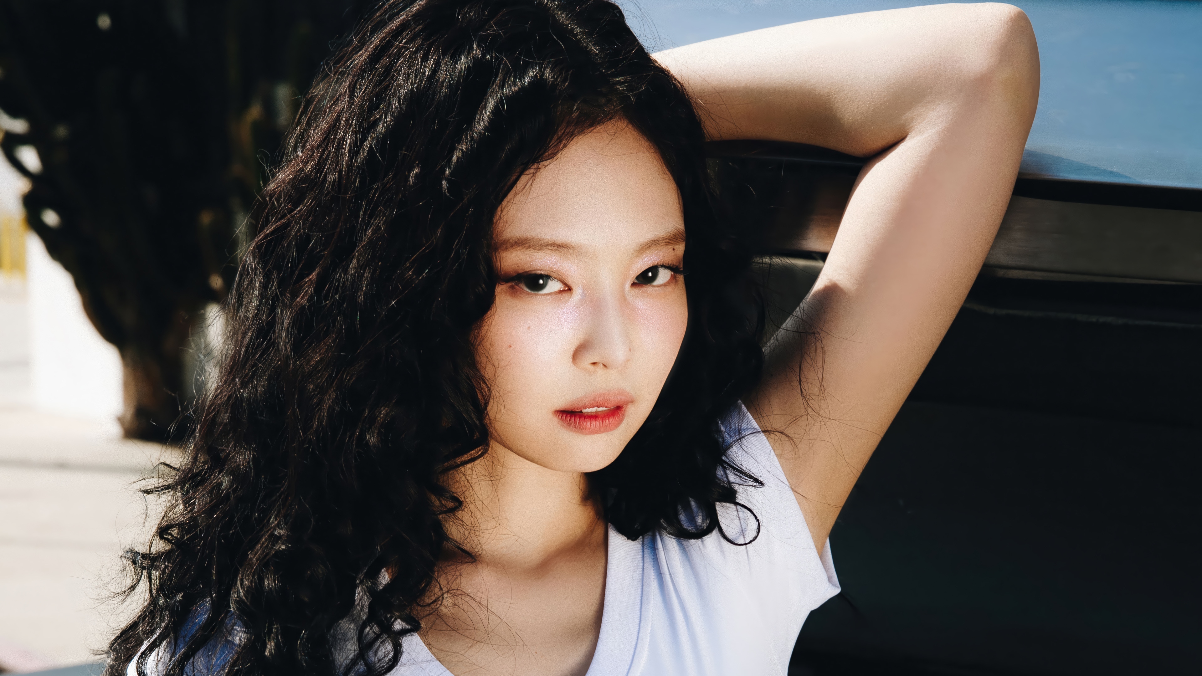 Jennie from Blackpink posing outdoors HD Wallpaper