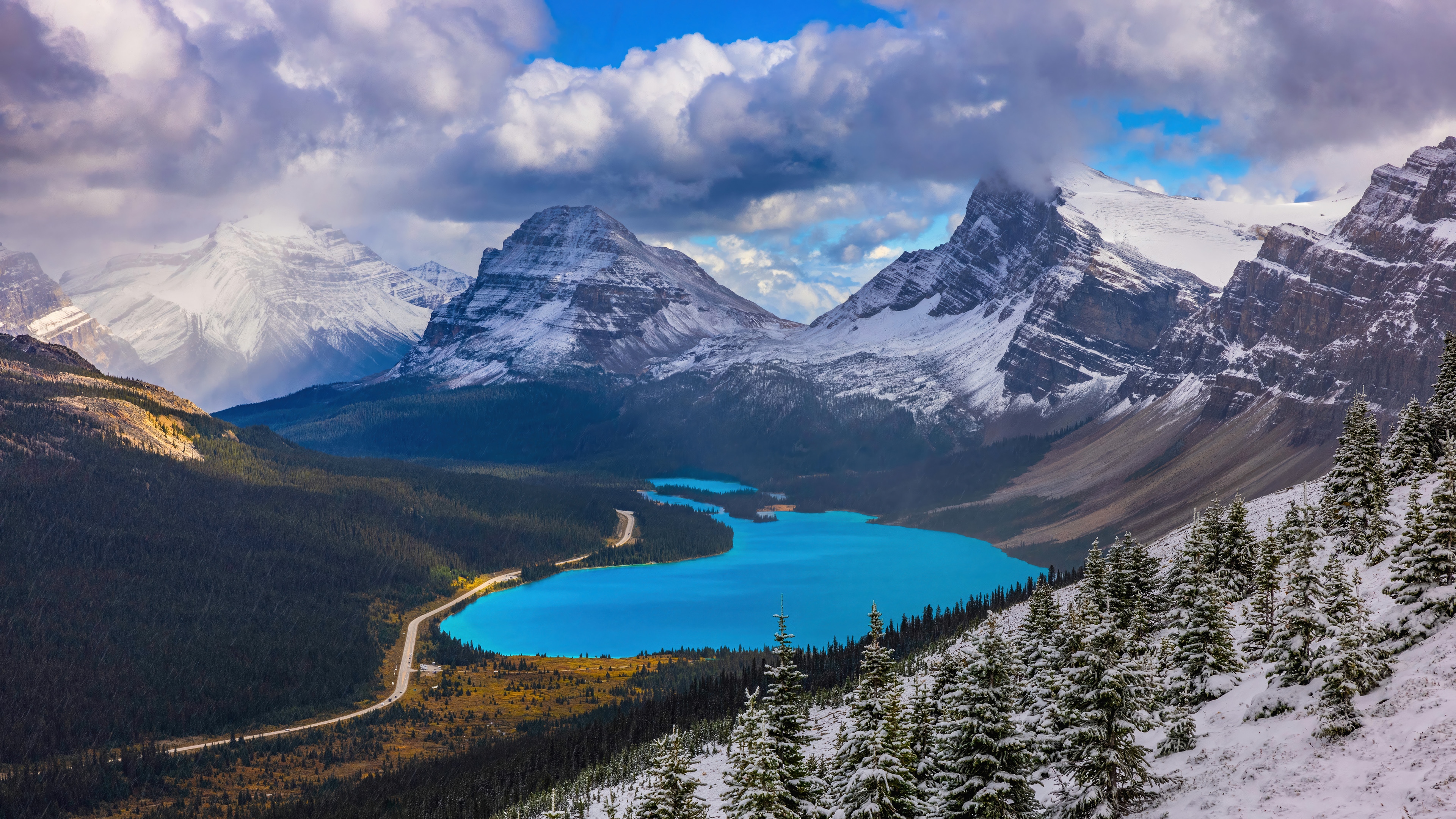 Snowy Mountains Overlooking a Bright Blue Lake HD Wallpaper