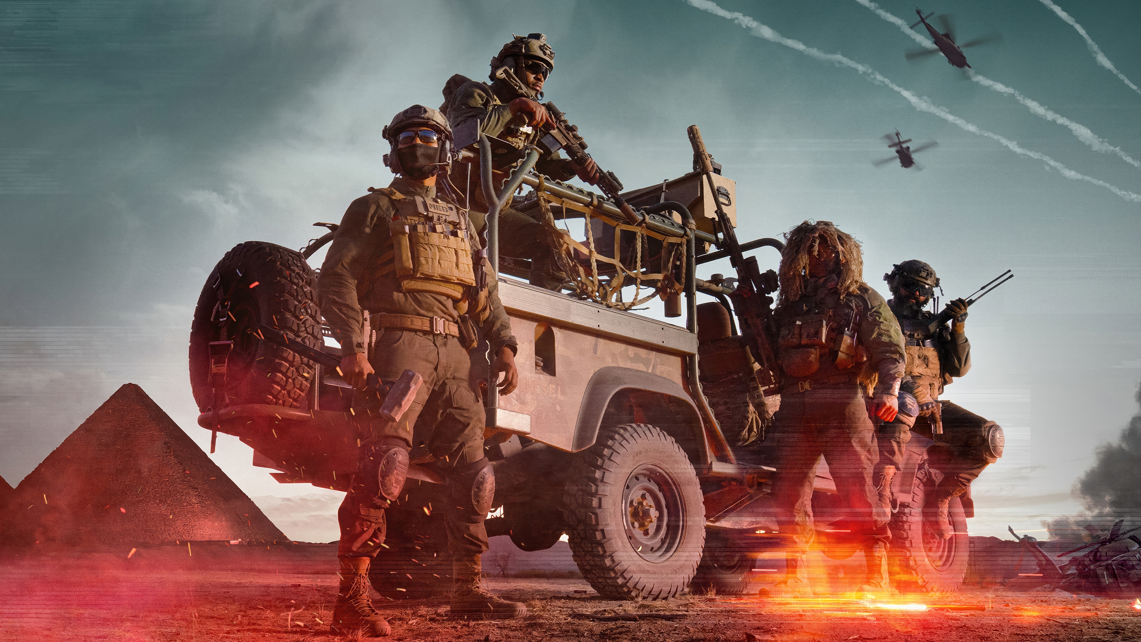 Soldiers in a desert with pyramids and helicopters HD Wallpaper