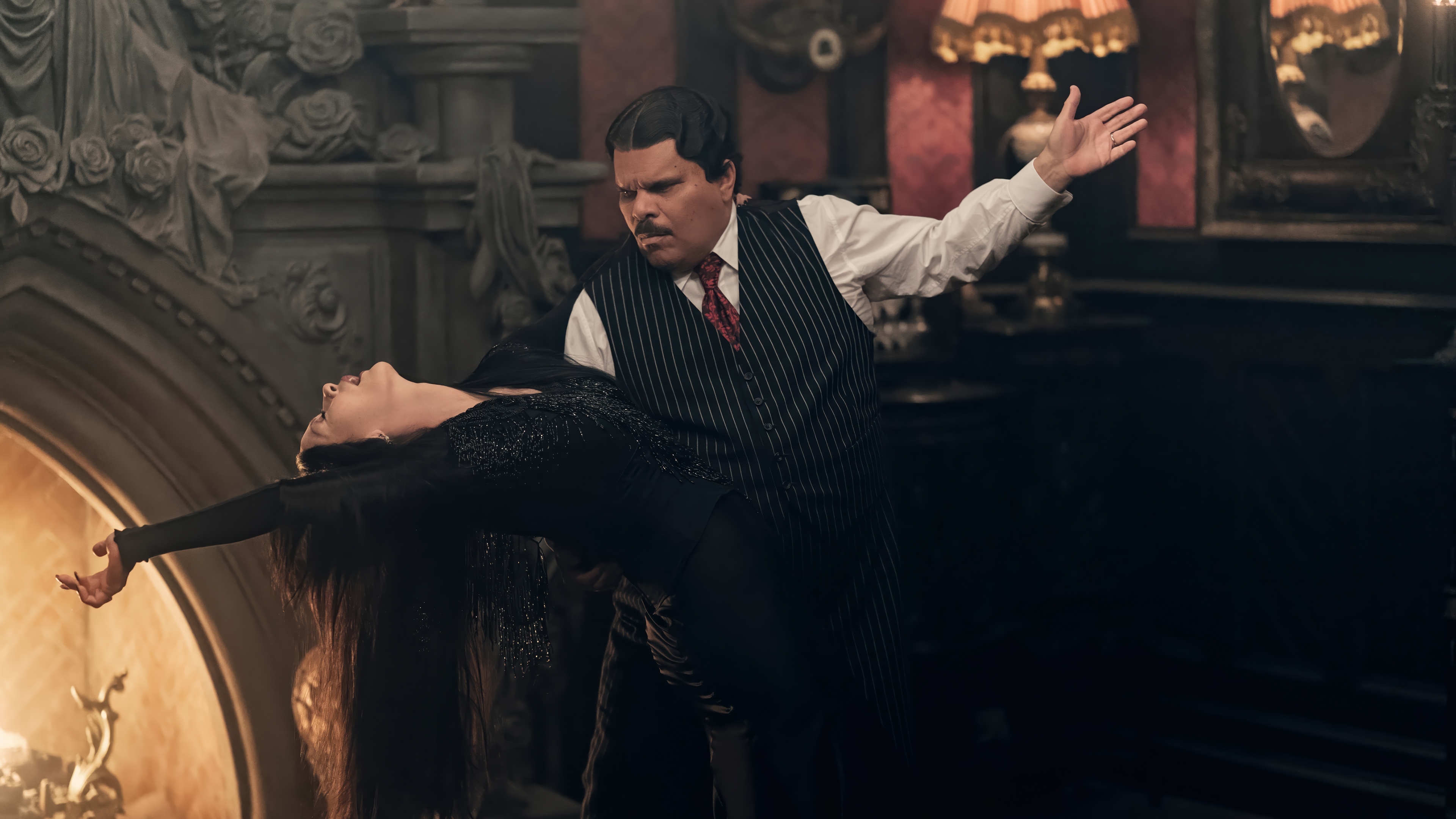 Gomez and Morticia Addams dancing in 4K HD Wallpaper