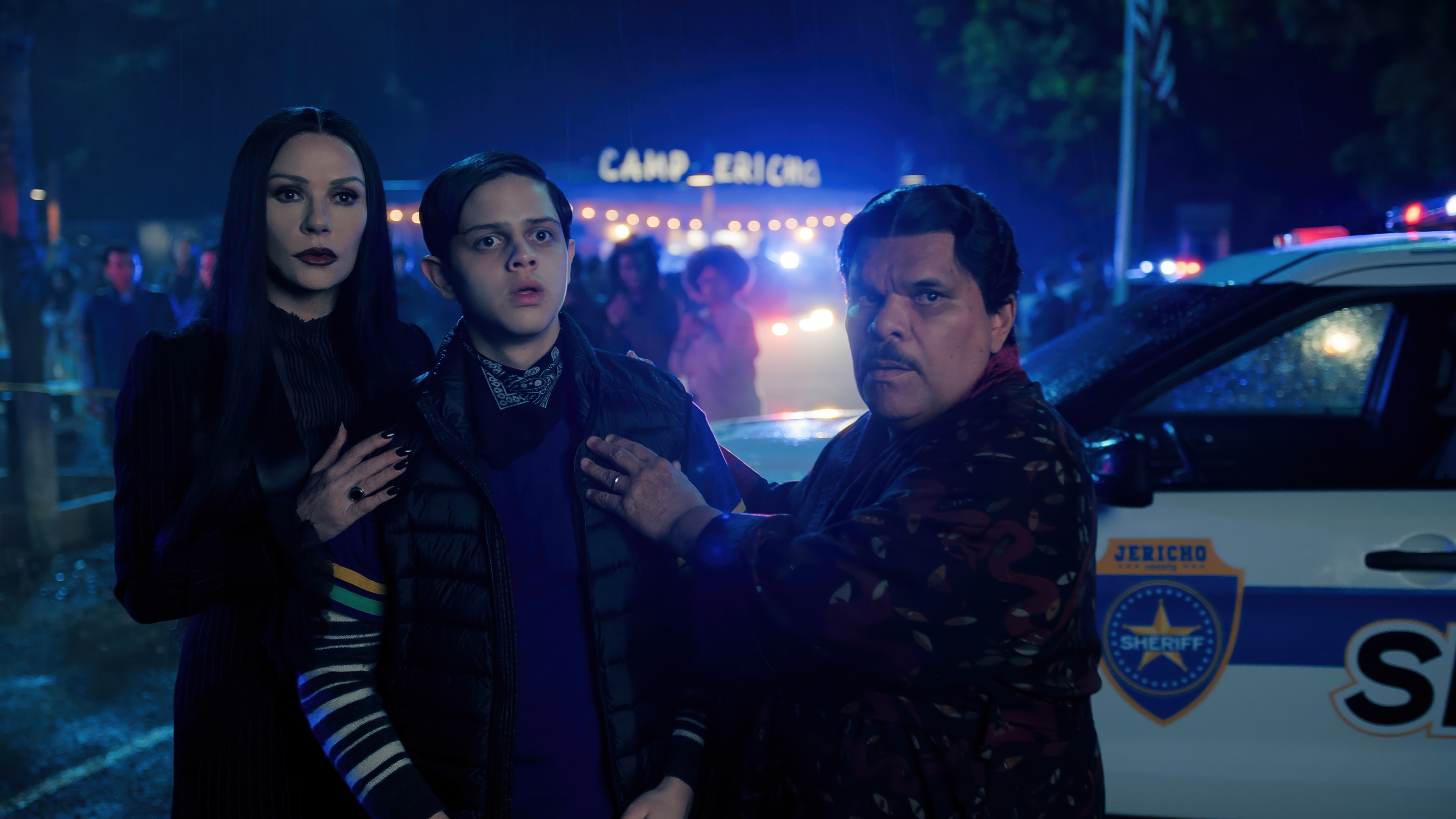 Morticia, Pugsley, and Gomez Addams at Camp Jericho HD Wallpaper
