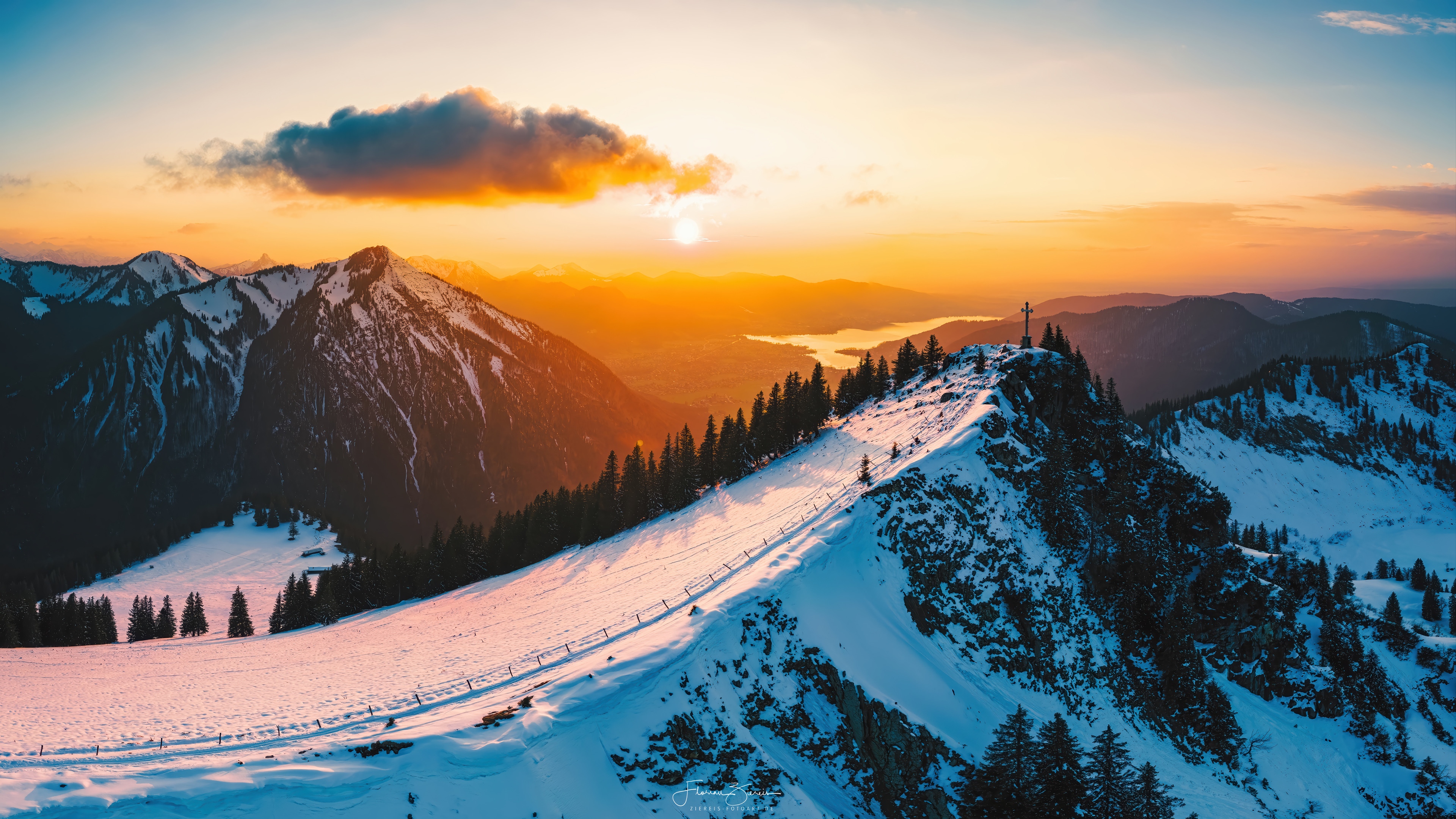 Sunrise over snowy mountains with a lake HD Wallpaper