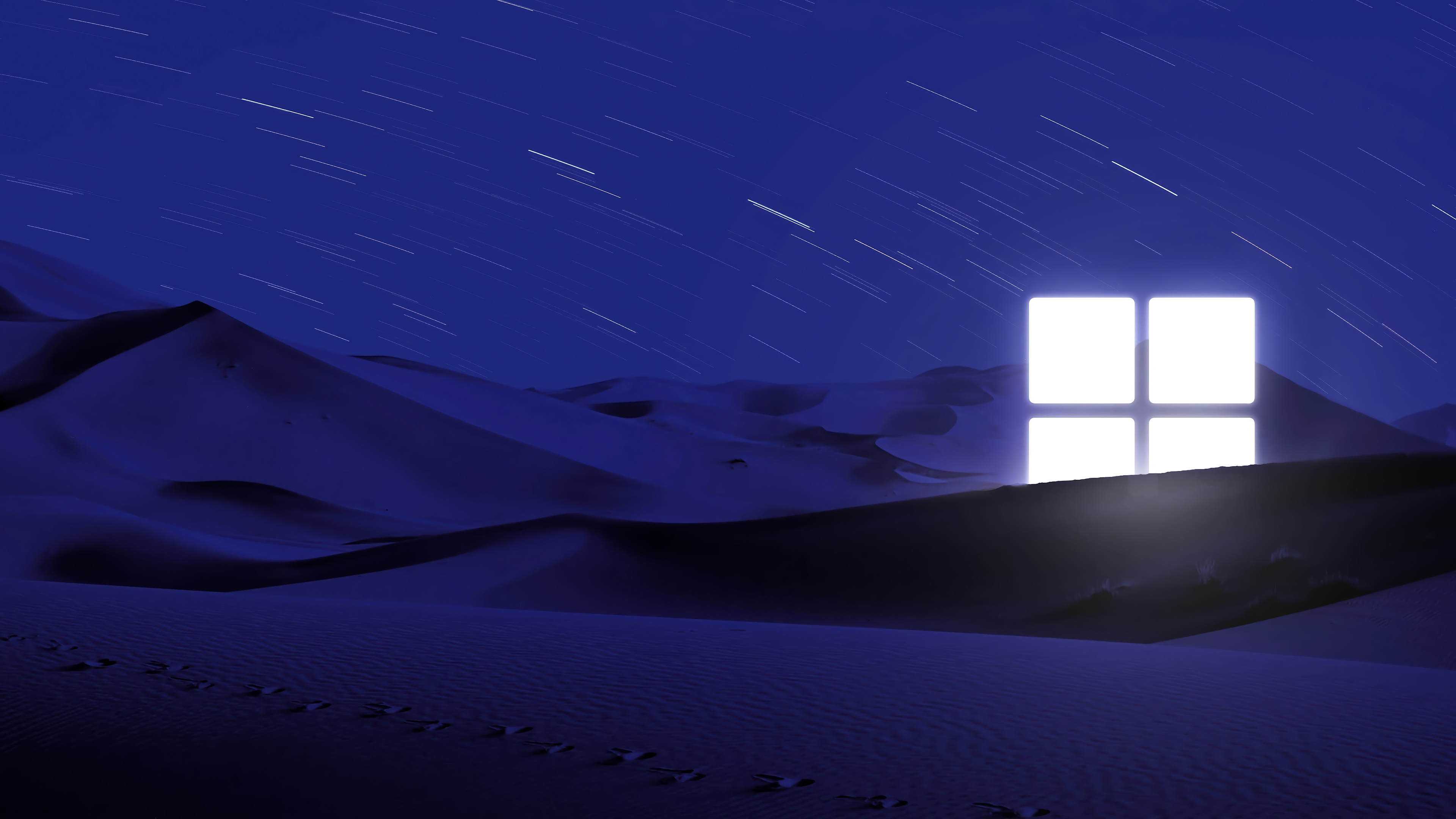 Windows 11 logo in a desert at night HD Wallpaper