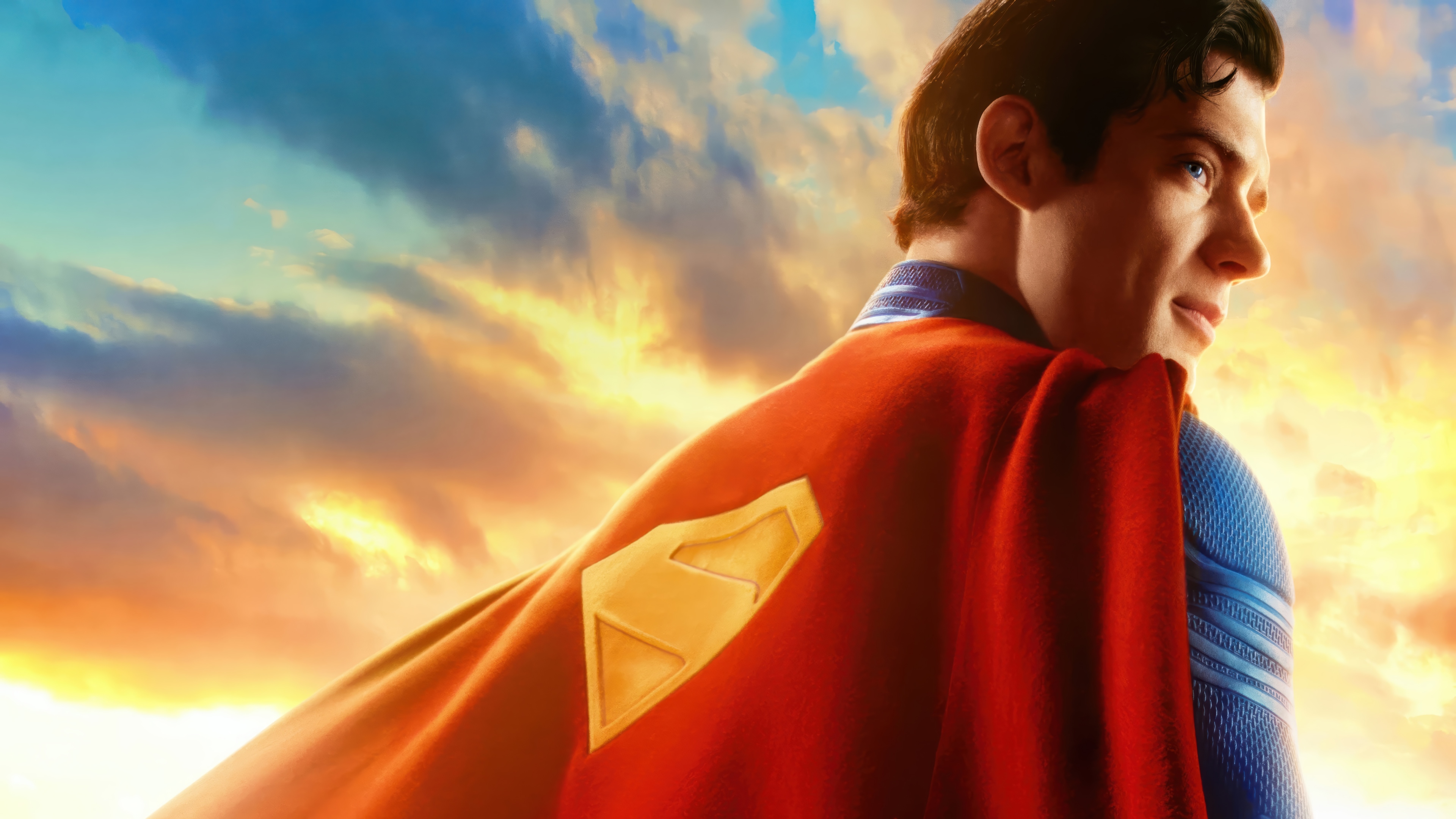 Superman 4K with Red Cape and Emblem HD Wallpaper
