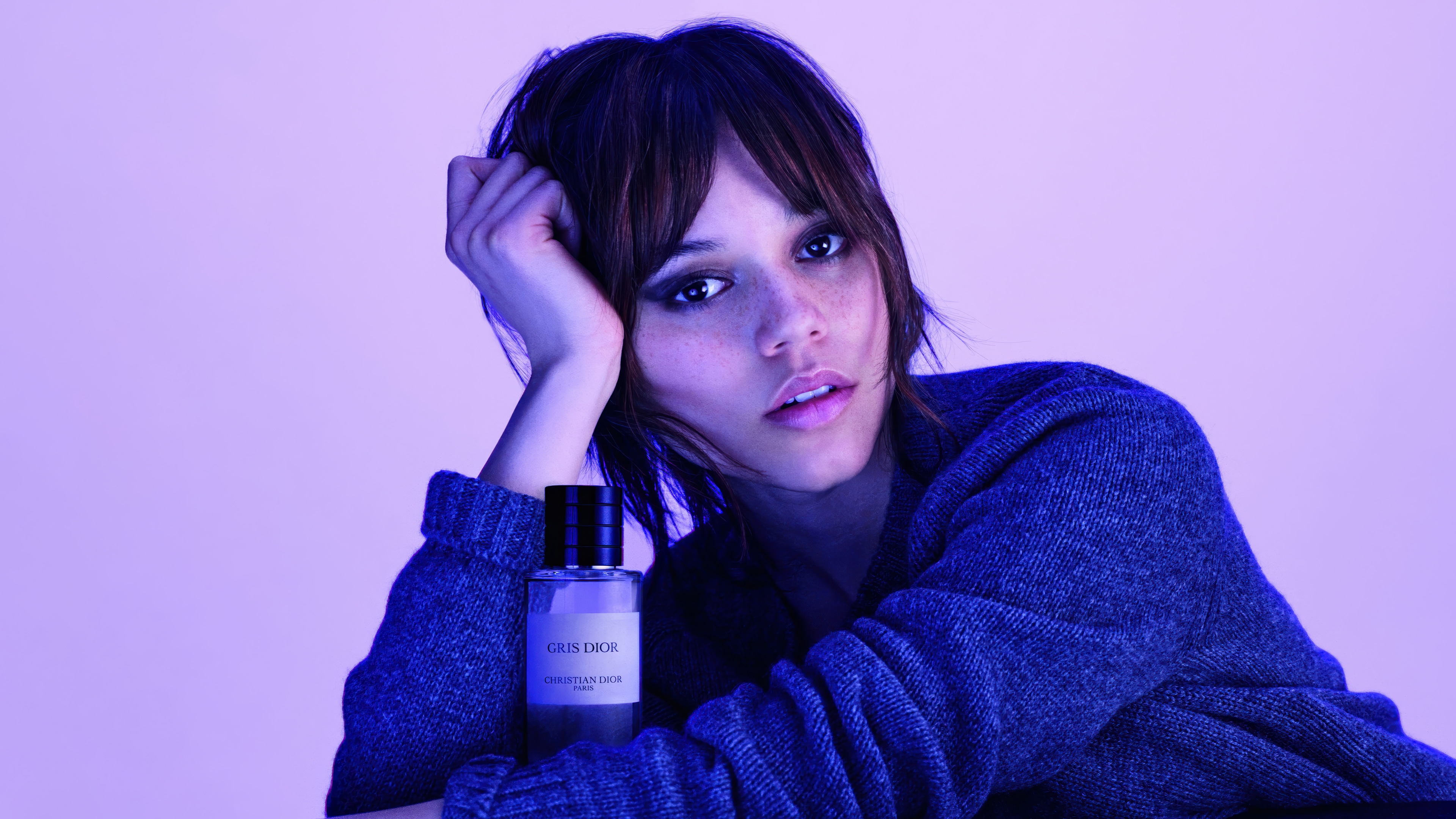 Jenna Ortega with Dior Gris Dior perfume HD Wallpaper