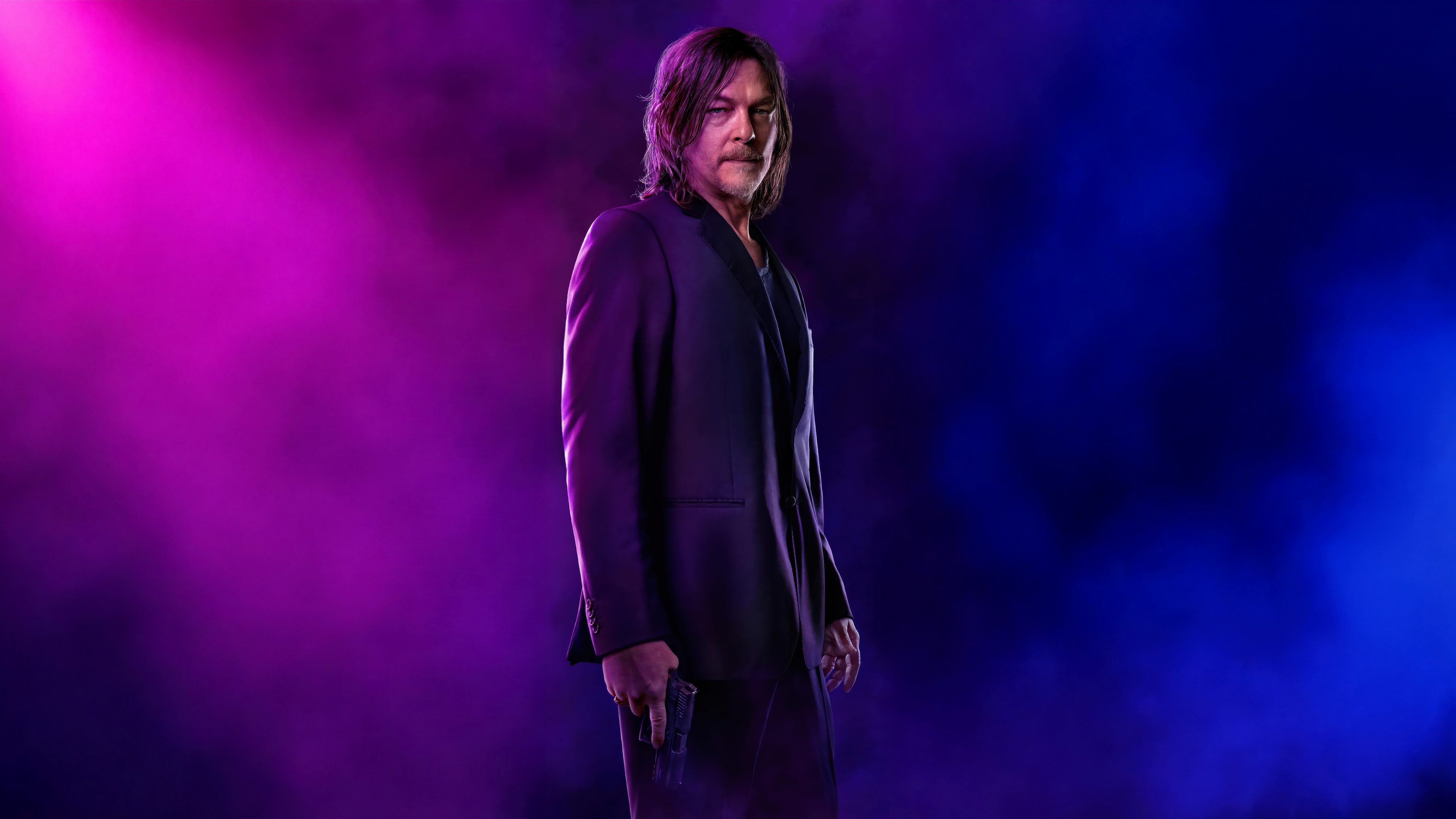 Norman Reedus in a suit holding a gun HD Wallpaper