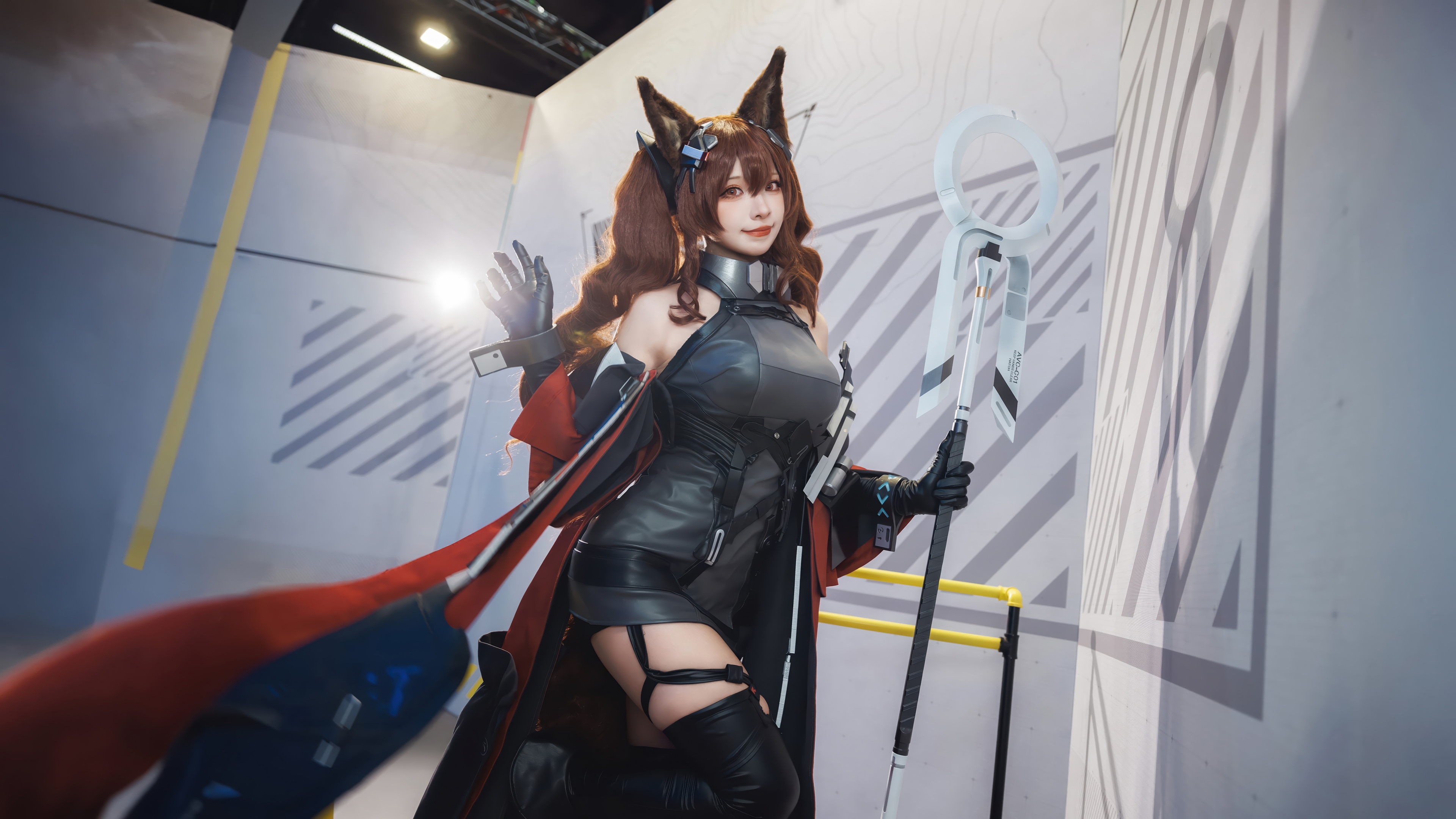Cosplayer dressed as Arknights character with staff HD Wallpaper