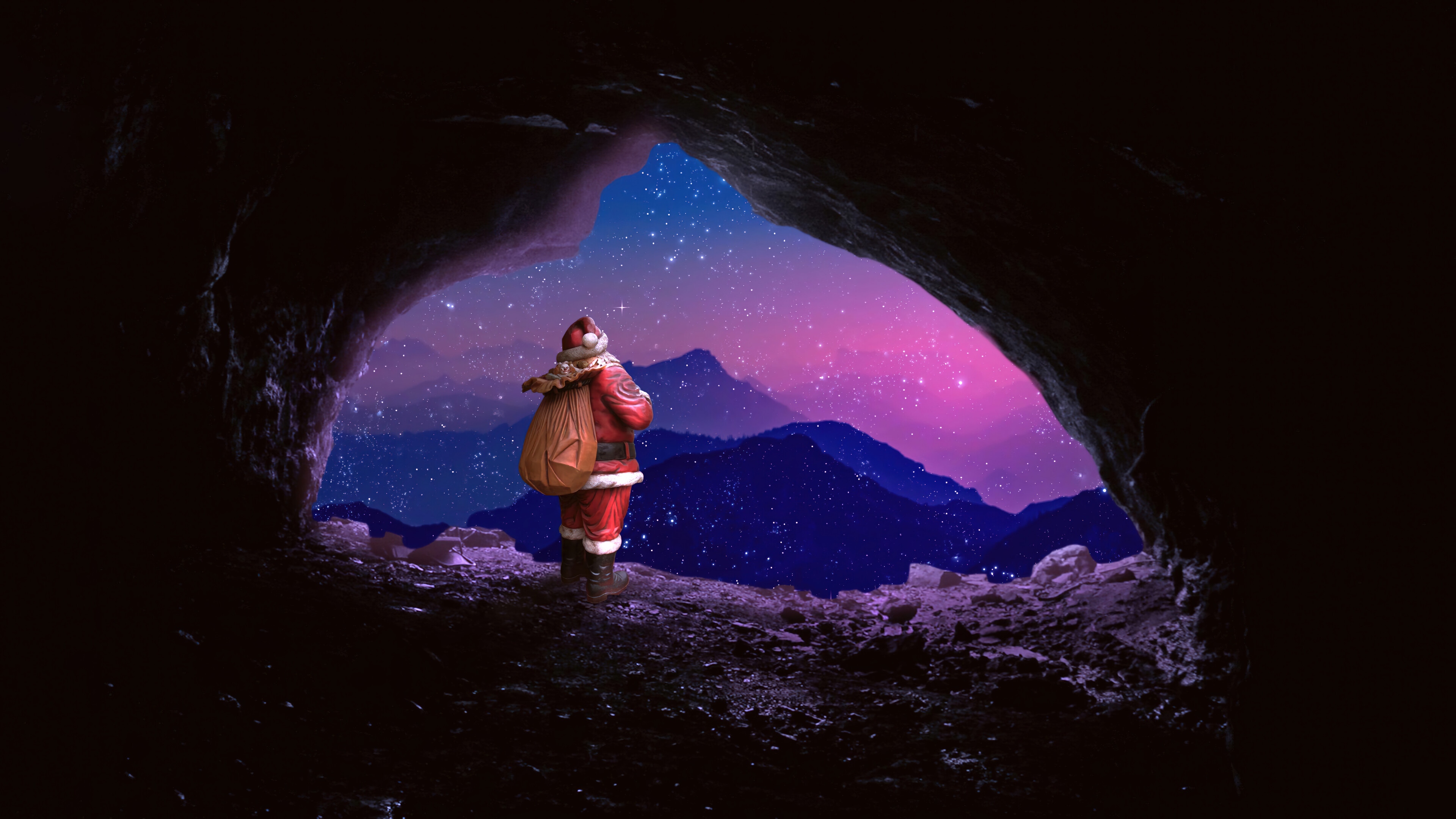 Santa Claus with a gift bag in a cave HD Wallpaper