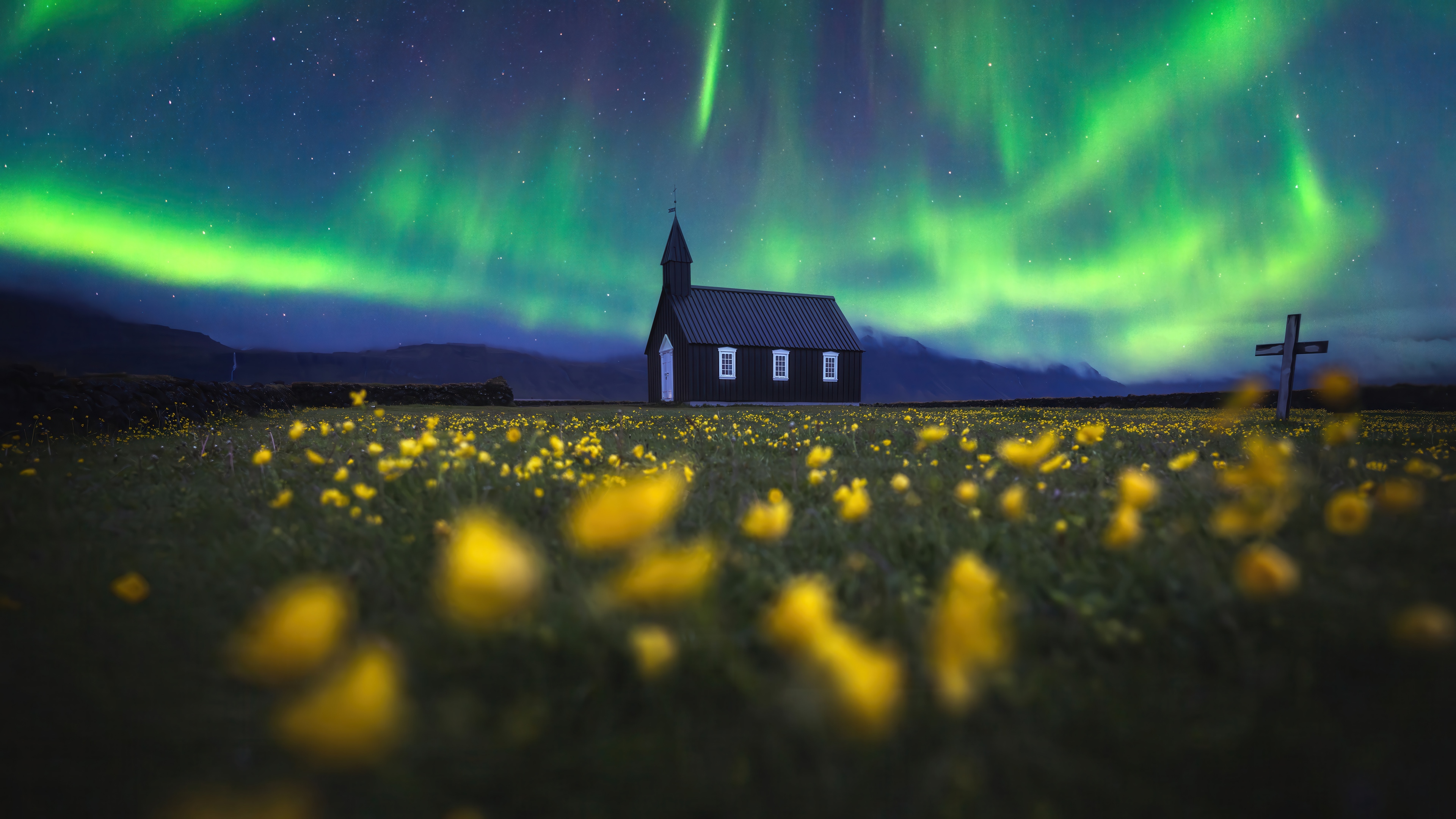 Black Chapel Under Northern Lights in Flower Field HD Wallpaper