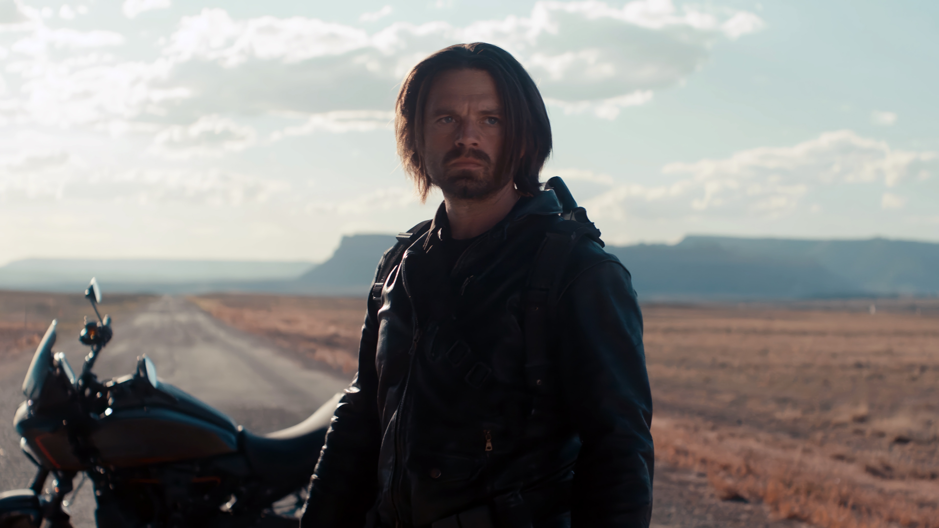 Bucky Barnes and Motorcycle in Desert Landscape 4K HD Wallpaper