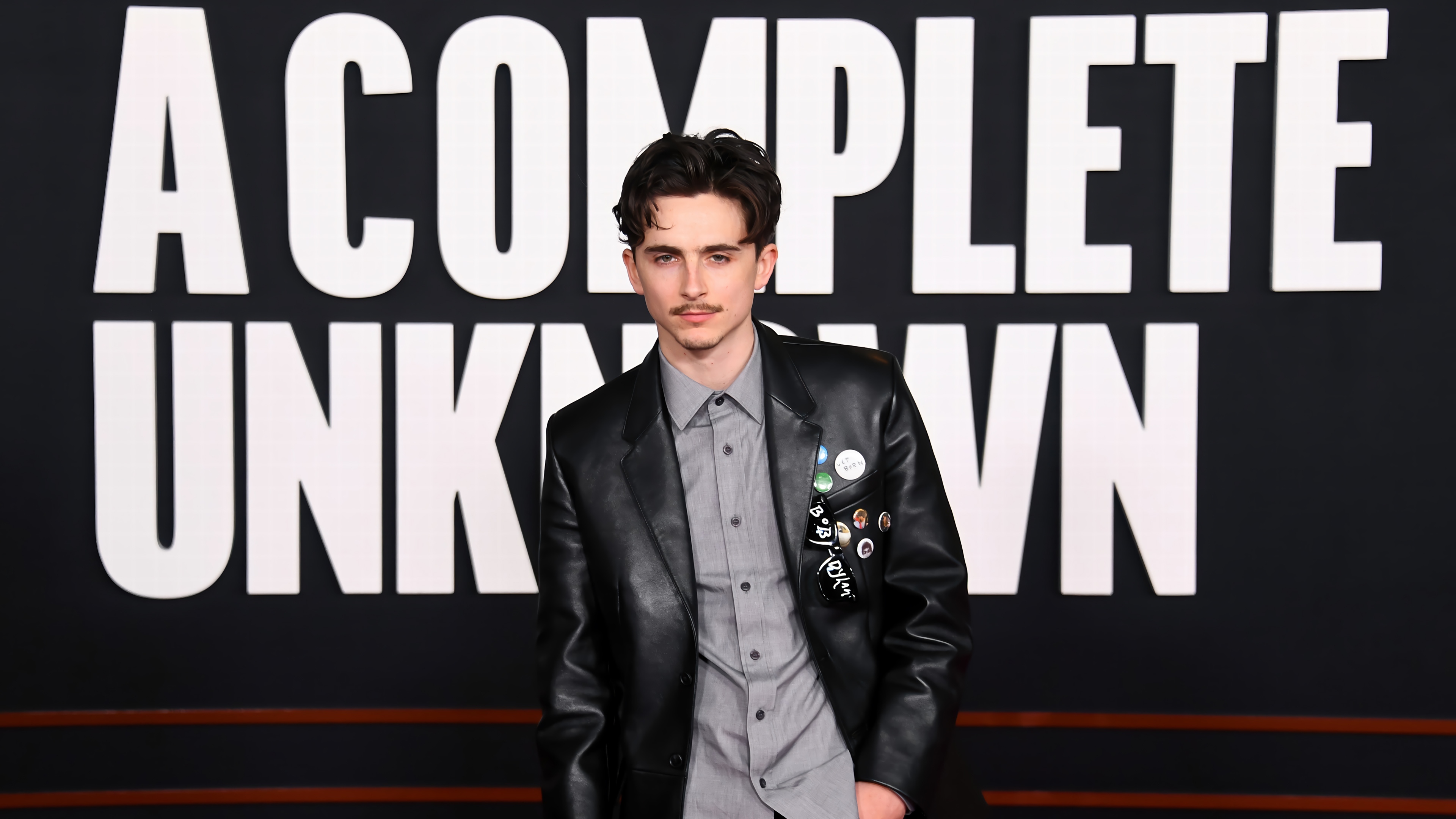 Timothee Chalamet at A Complete Unknown premiere 4K HD Wallpaper