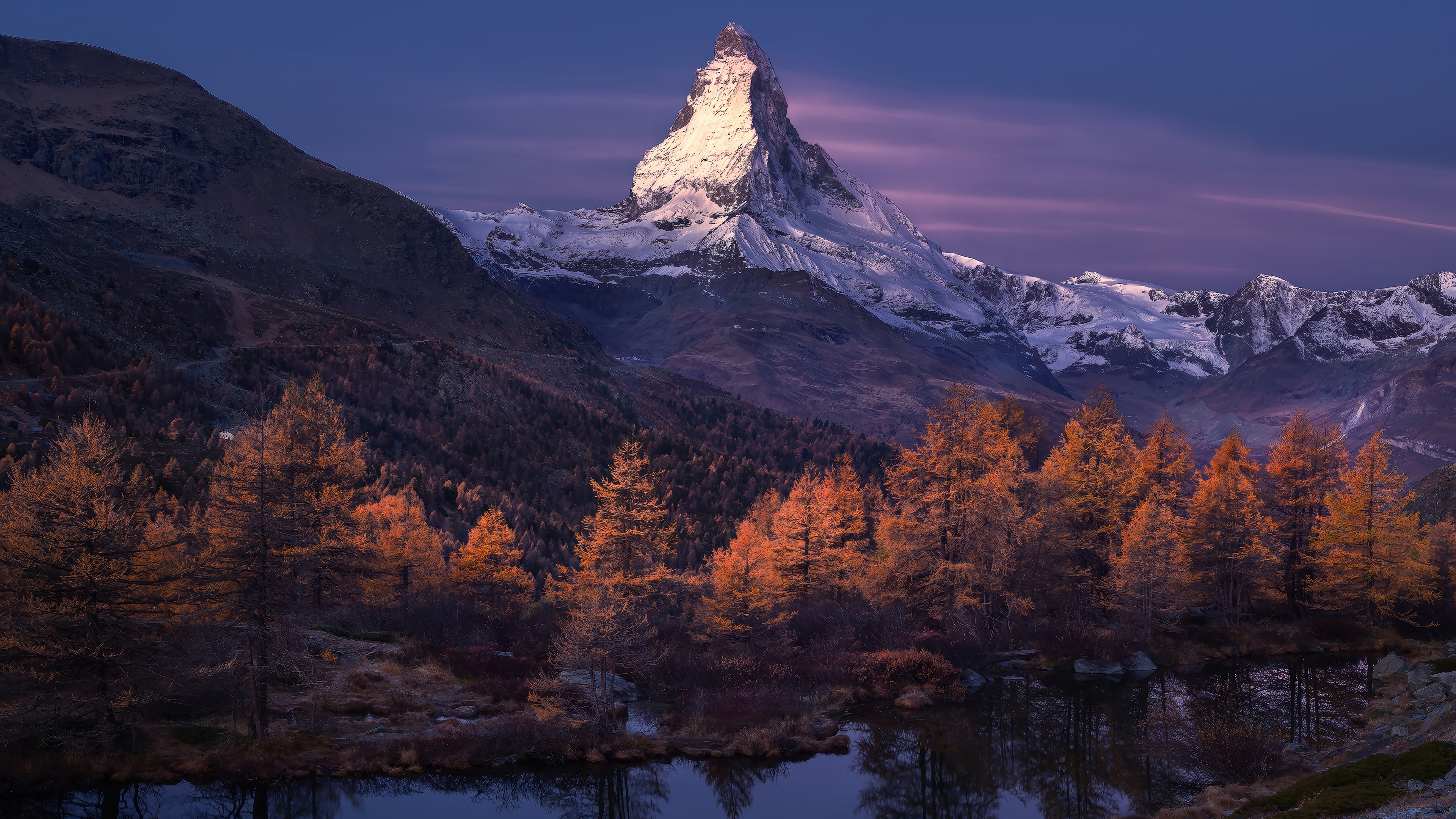 Matterhorn mountain in autumn with lake reflection HD Wallpaper