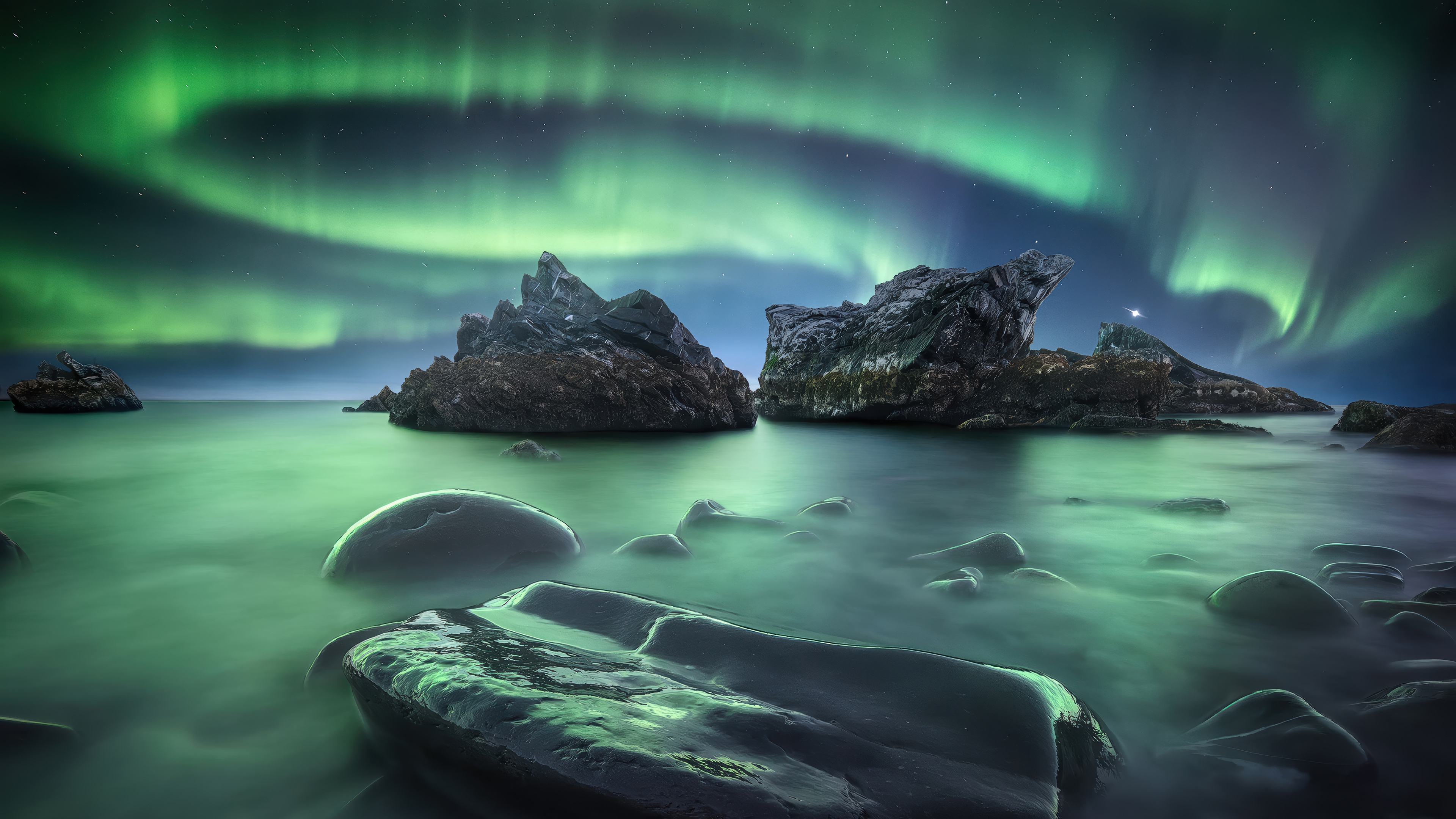 Aurora Borealis over rocky coast 4K HD Wallpaper
