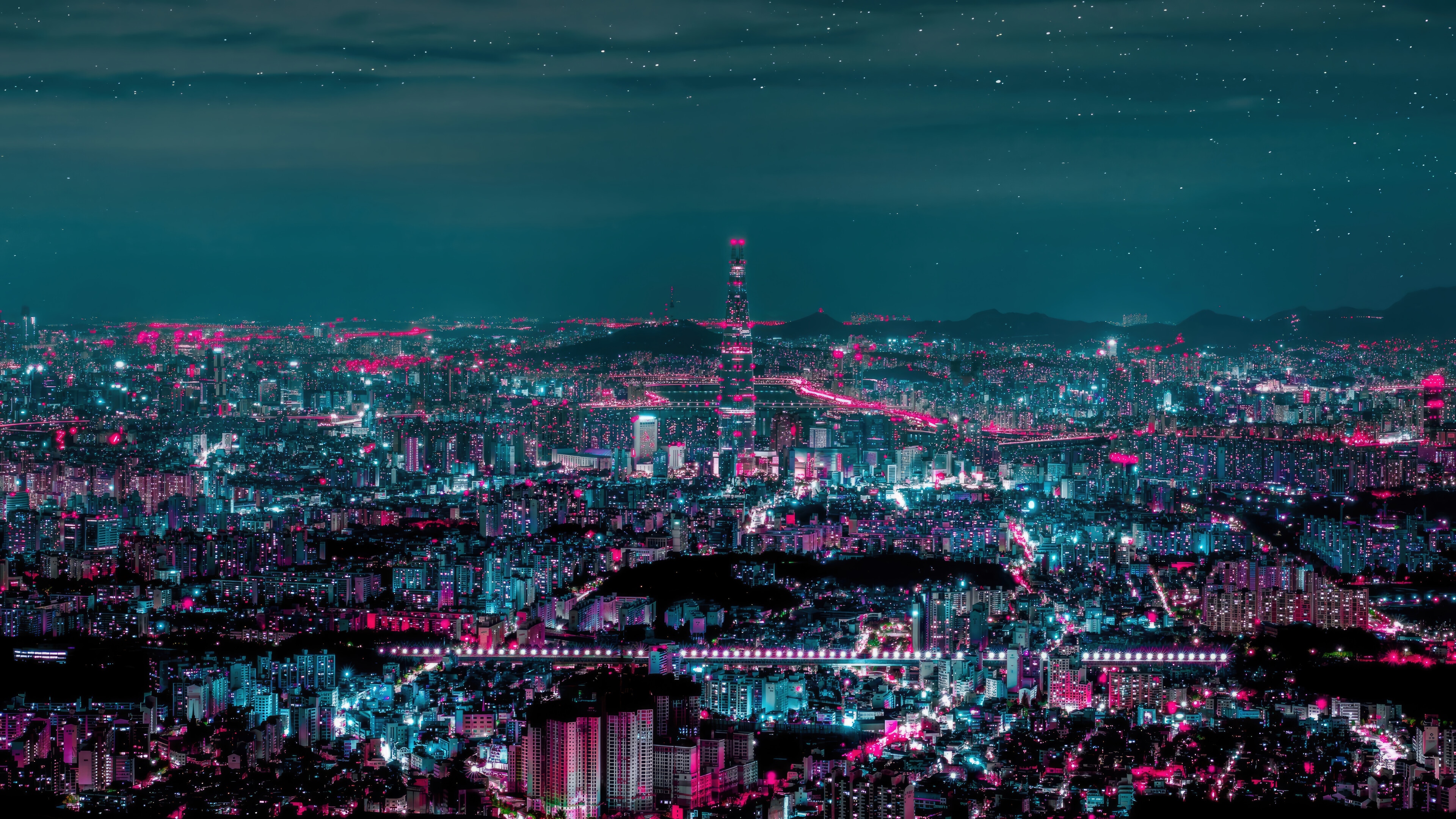 Cityscape at Night with Tall Buildings and Stars HD Wallpaper