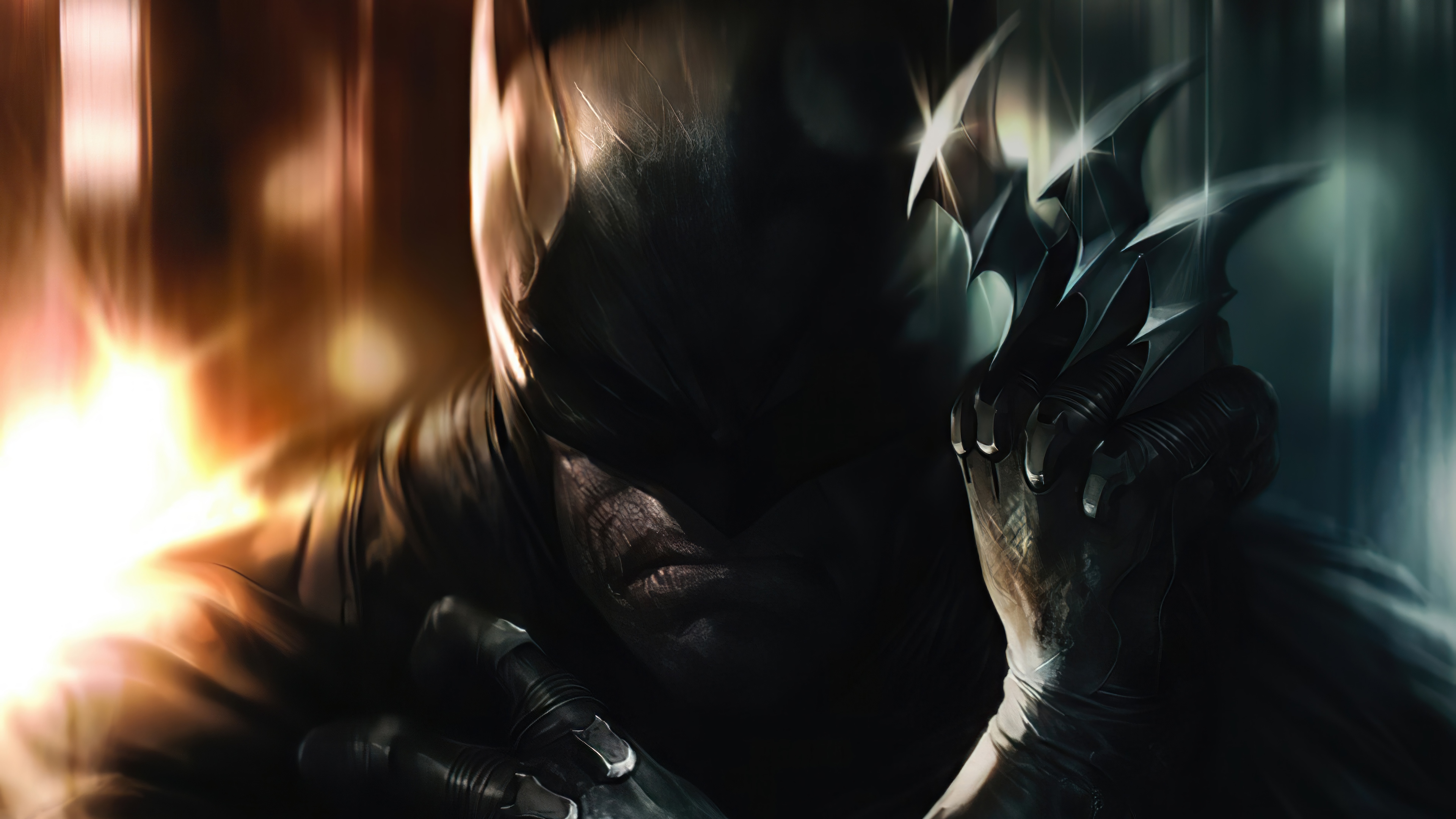 Batman holding a Batarang in 4K HD Wallpaper