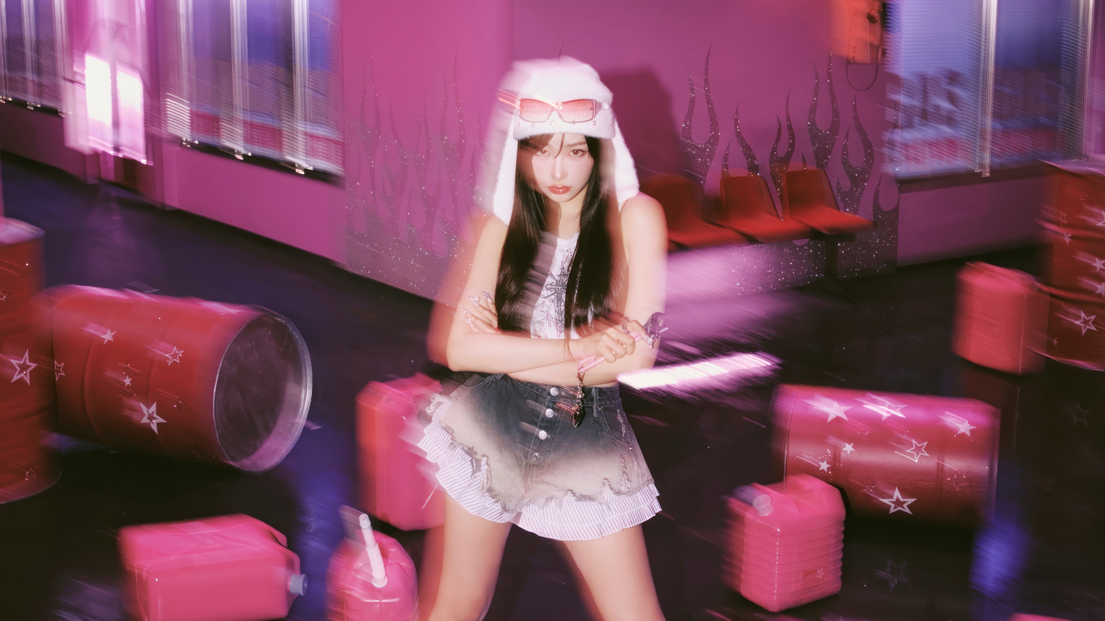 Giselle from Aespa in a pink room with red barrels HD Wallpaper