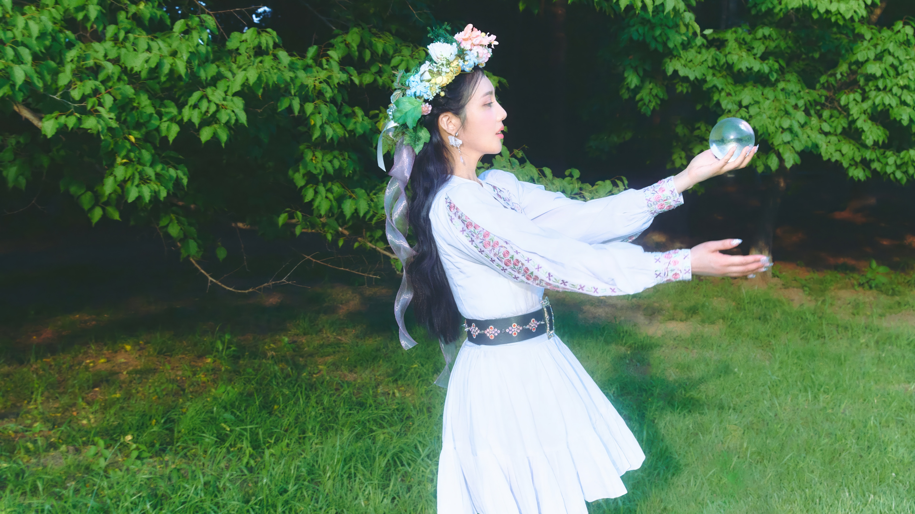 Joy from Red Velvet holds a crystal ball HD Wallpaper