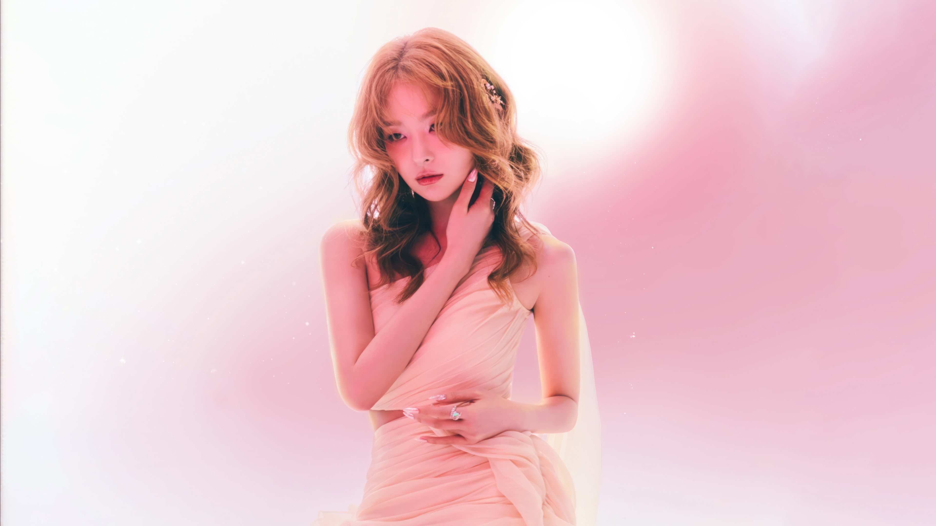 Seulgi in a flowing pink dress with floral accents HD Wallpaper